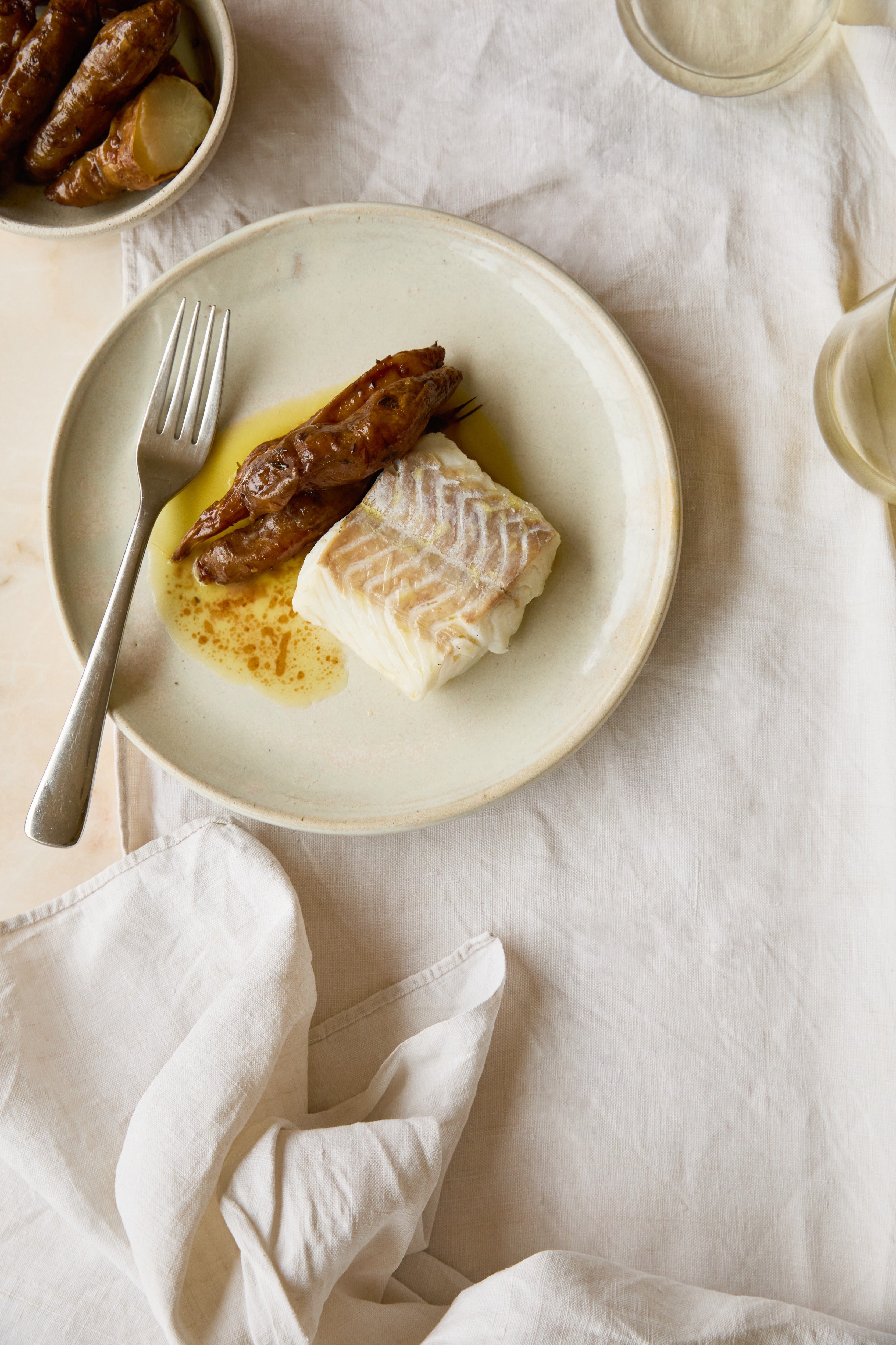 Mild, flaky hake gets a rich autumn upgrade with buttery artichokes and a savoury miso glaze