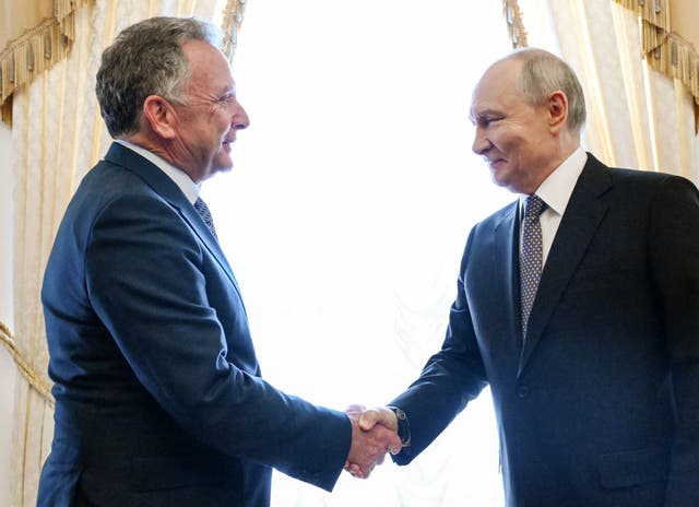 Russian president Vladimir Putin shakes hands with US special envoy Steve Witkoff during a meeting at the Constantine Palace in St Petersburg