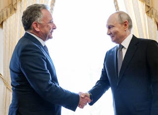 Russian president Vladimir Putin shakes hands with US special envoy Steve Witkoff during a meeting at the Constantine Palace in St Petersburg
