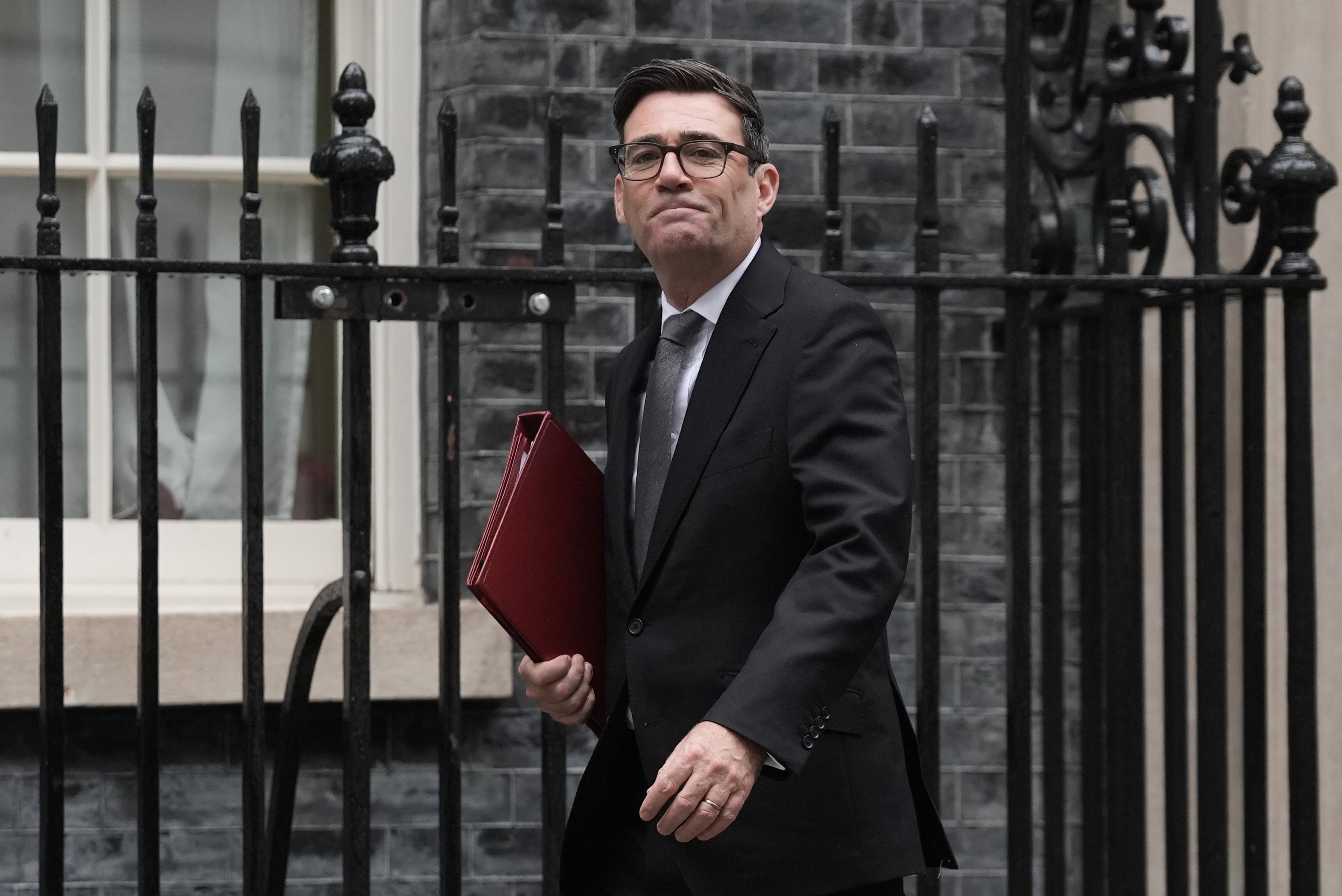 Prime Minister Andy Burnham on his way to PMQs on Wednesday (Stefan Rousseau/PA)
