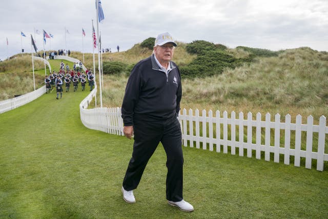 Donald Trump lost a legal battle with the Scottish Government to stop a wind turbine development visible from his Aberdeenshire golf course (Jane Barlow/PA)
