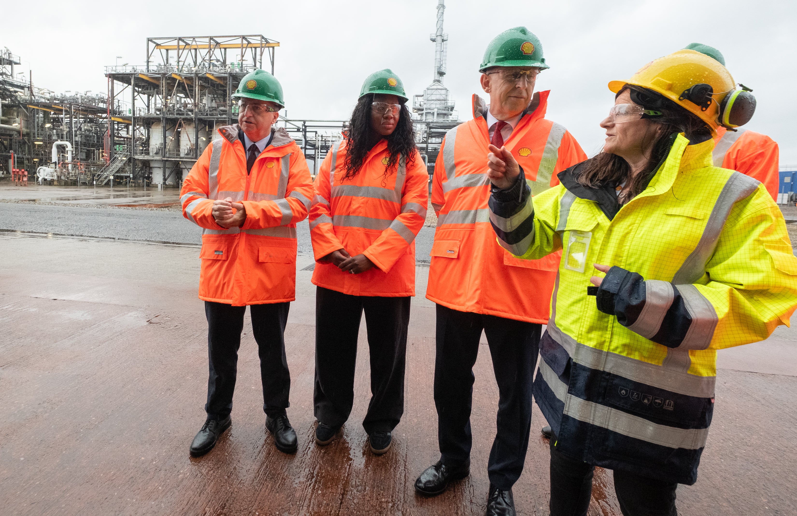 Scottish secretary Douglas Alexander, energy secretary Miatta Fahnbulleh and chancellor of the exchequer, John Healey during a visit to Shell UK's St Fergus Gas Terminal in Peterhead, Aberdeenshire,