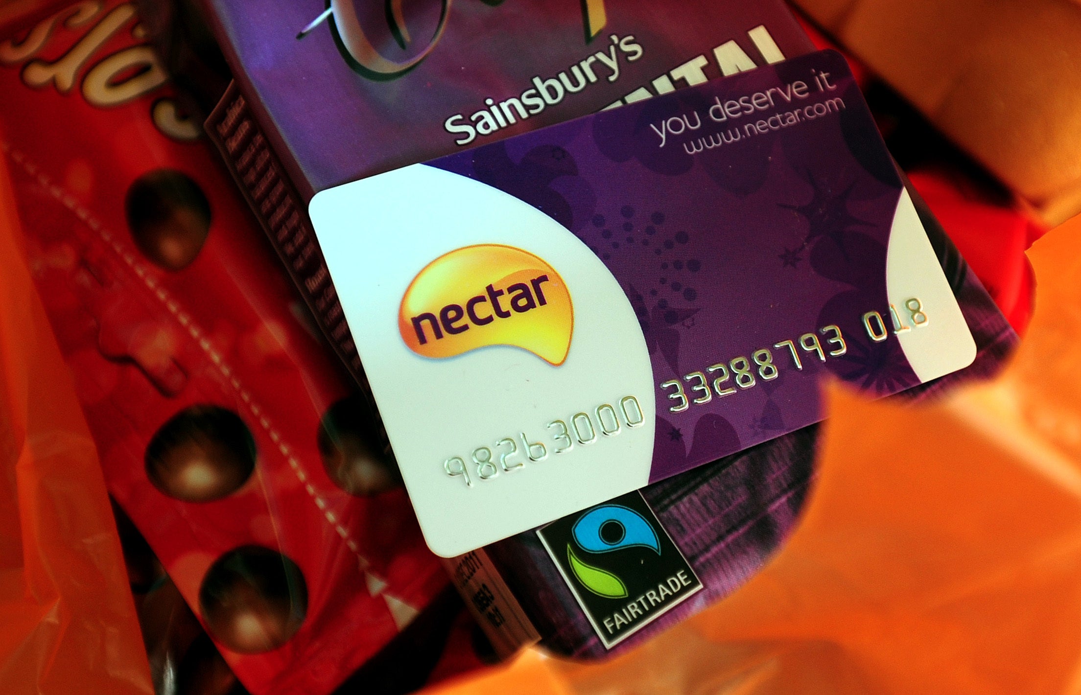 Sainsbury’s said it benefited from pricing measures including its Nectar loyalty card (PA)