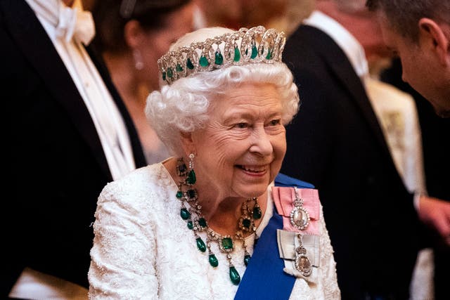 Queen Elizabeth II wearing the Greville emerald and diamond necklace at a diplomatic reception in Buckingham Palace in 2019