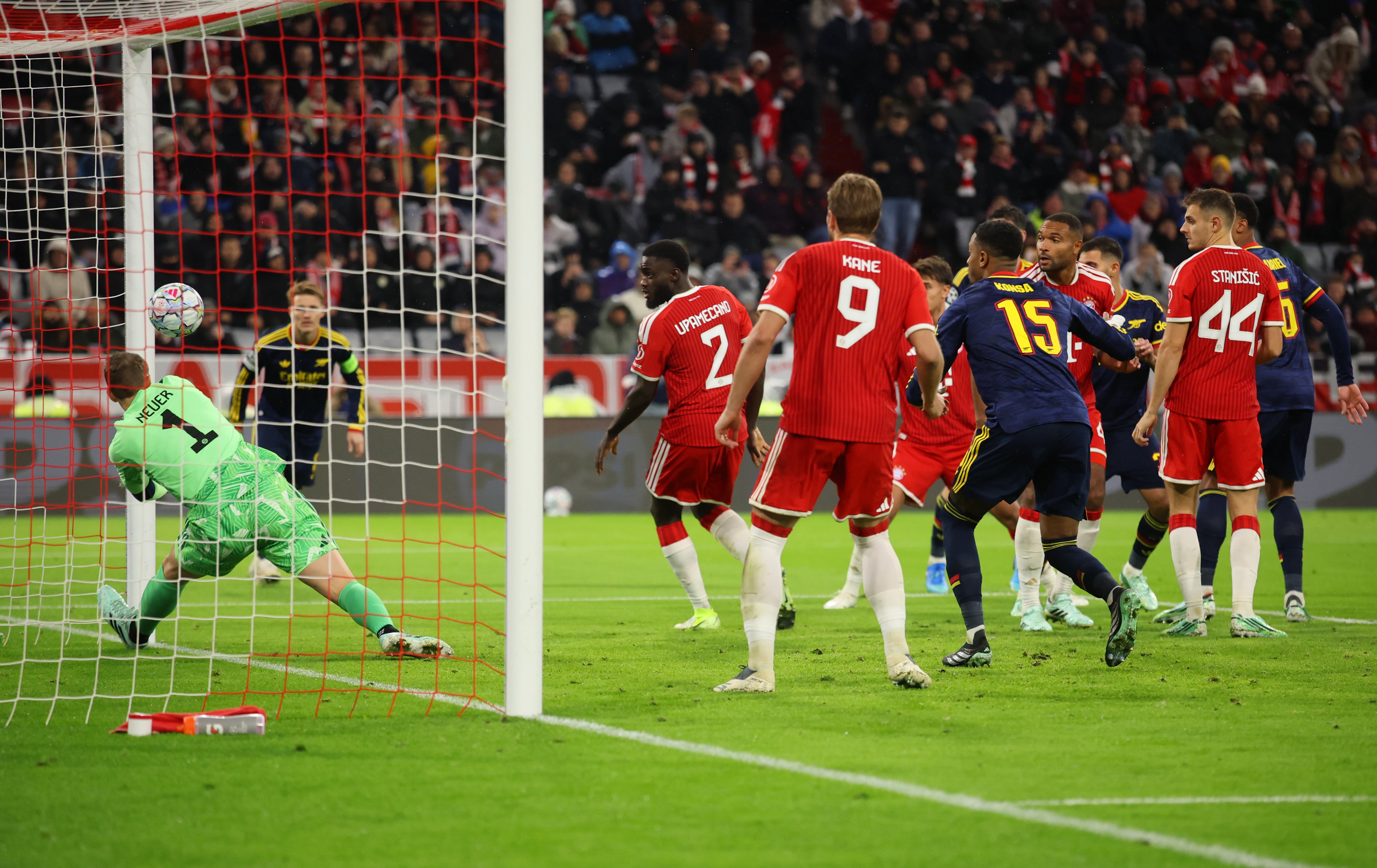 Manuel Neuer of FC Bayern Muenchen makes a save against Arsenal