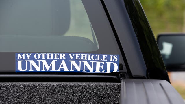 A bumper sticker displayed on a car during a drone demonstration at a farm and winery, June 11, 2015 in Cordova, Md.