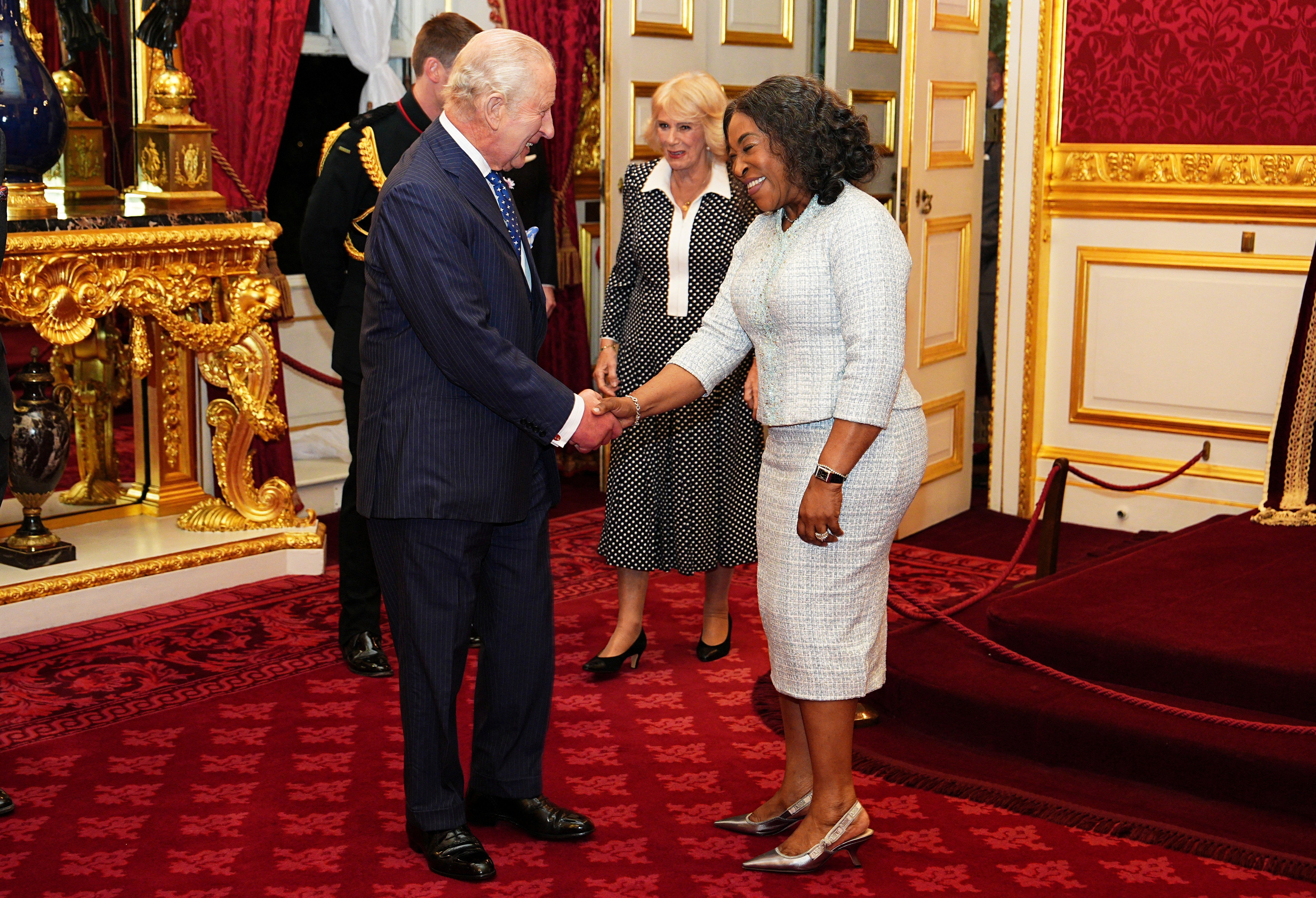 King Charles III and Queen Camilla speak to Shirley Botchwey, Commonwealth Secretary-General, during a reception at St. James's Palace in London, to celebrate the Commonwealth Diaspora, ahead of the Commonwealth Heads of Government Meeting in Antigua and Barbuda, October 14, 2026.