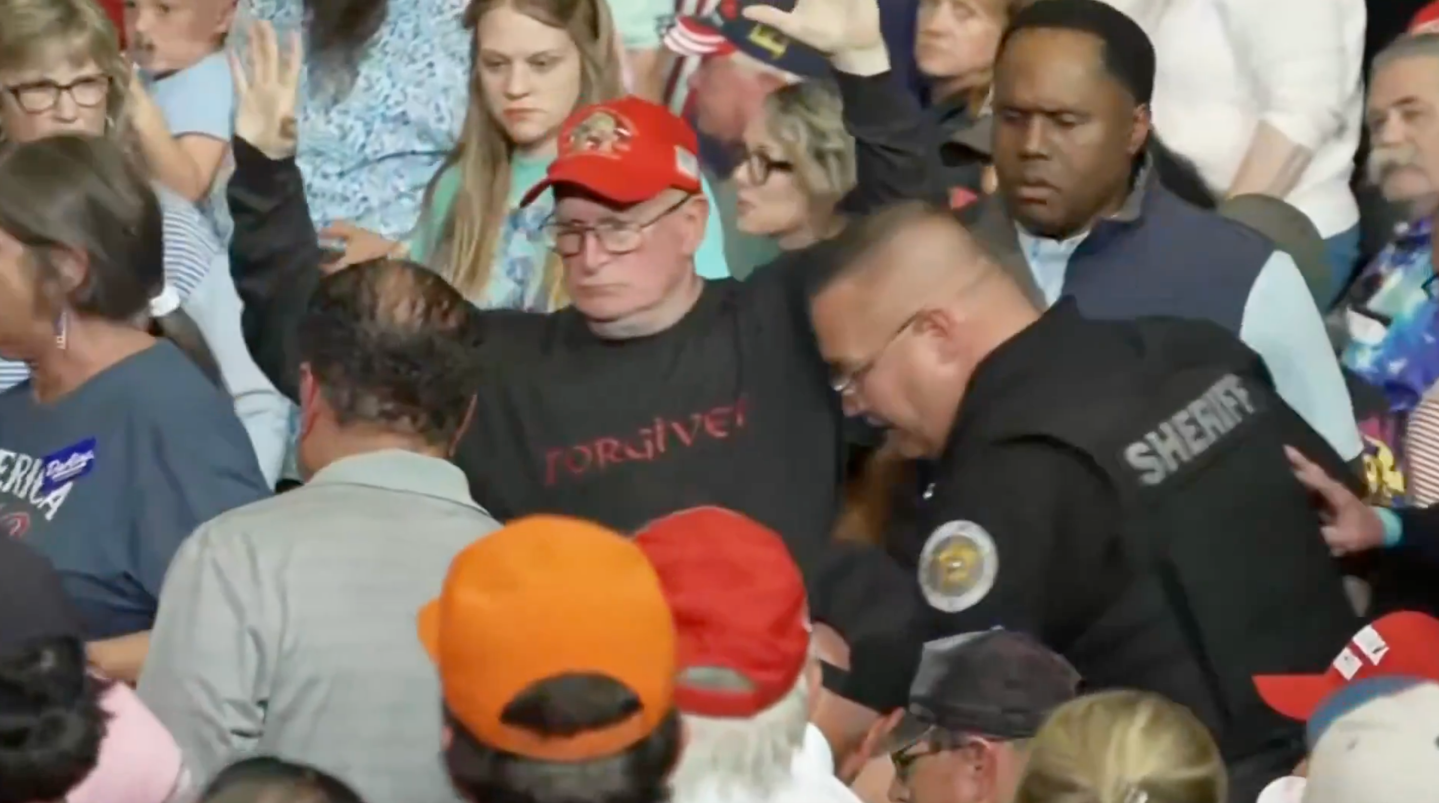 Police came to the aid of the protester struck during the melee and led him out of the venue for his own safety as Trump providing a gloating commentary from the stage