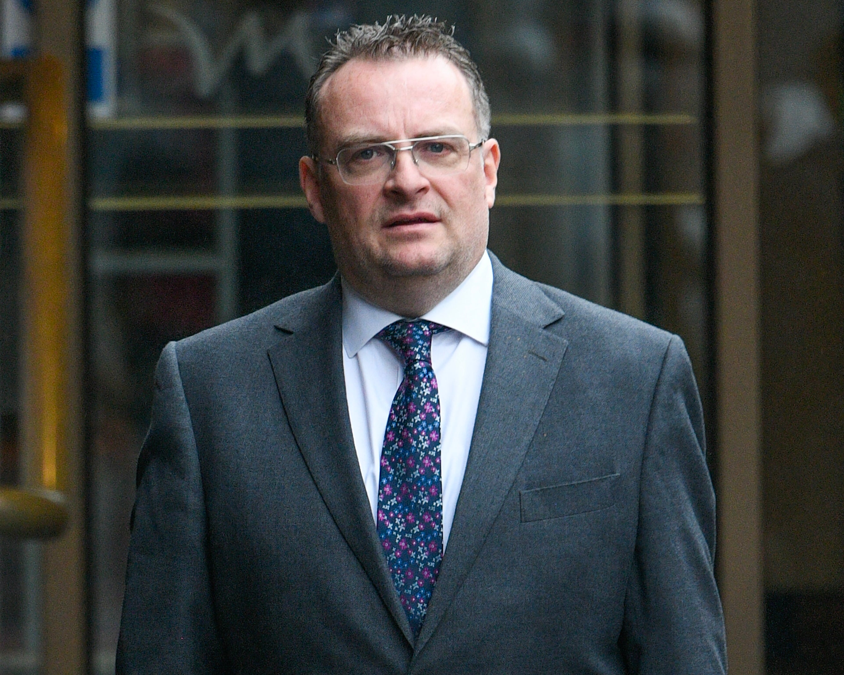 Millionaire Starbucks boss ordered to tear down tennis court and gym in planning row