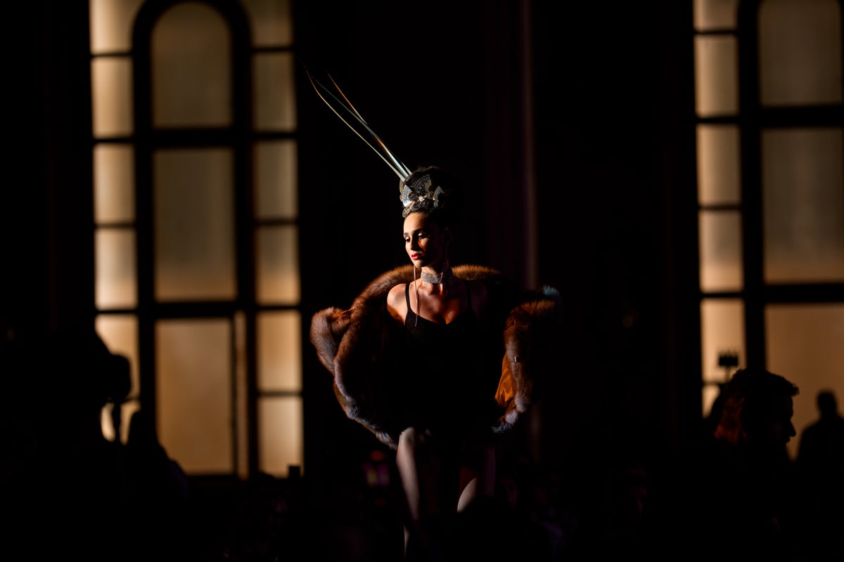 Models in wheelchairs take center stage at Romanian fashion show, in photos