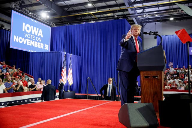 US president Donald Trump points as he speaks during a Republican campaign rally in Sioux City, Iowa, US, 22 October 2026