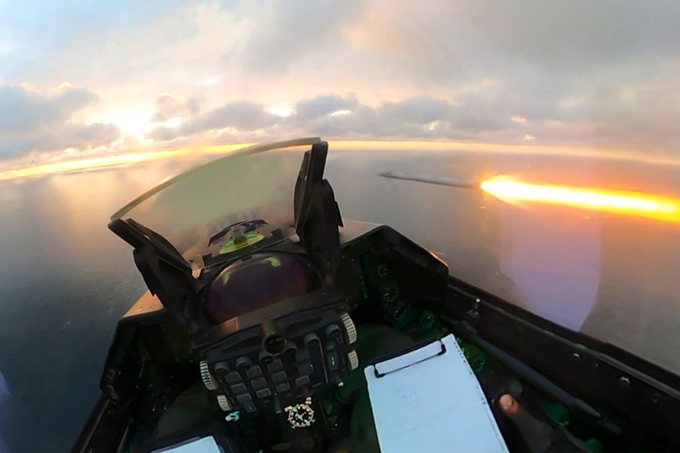 An image distributed by Romania's Ministry of Defense shows a missile being fired at jet powered Geran drones that entered the country's airspace Sunday, Oct. 18