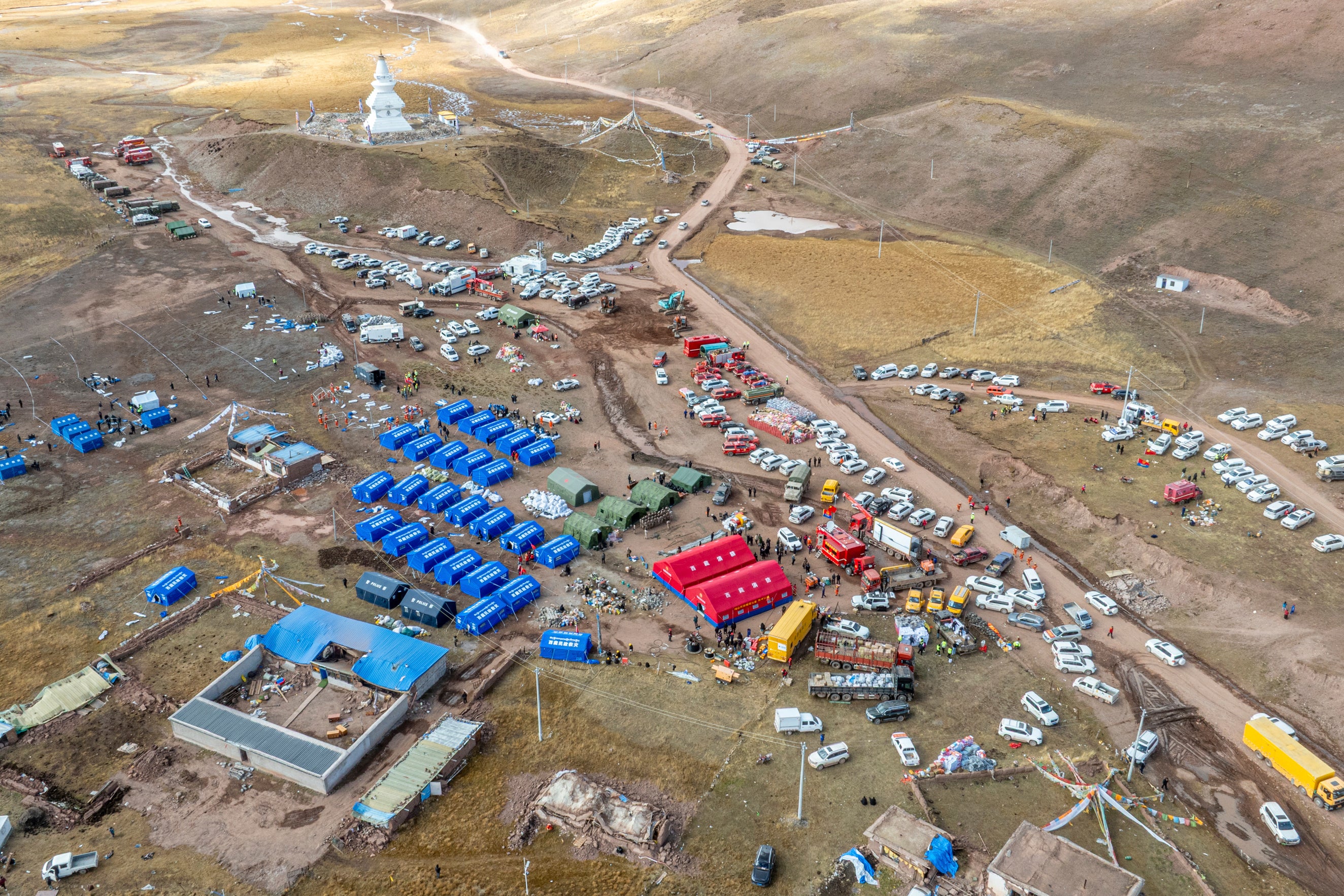 Thousands of rescuers search for survivors as powerful earthquake and nearly 400 aftershocks jolt Tibet