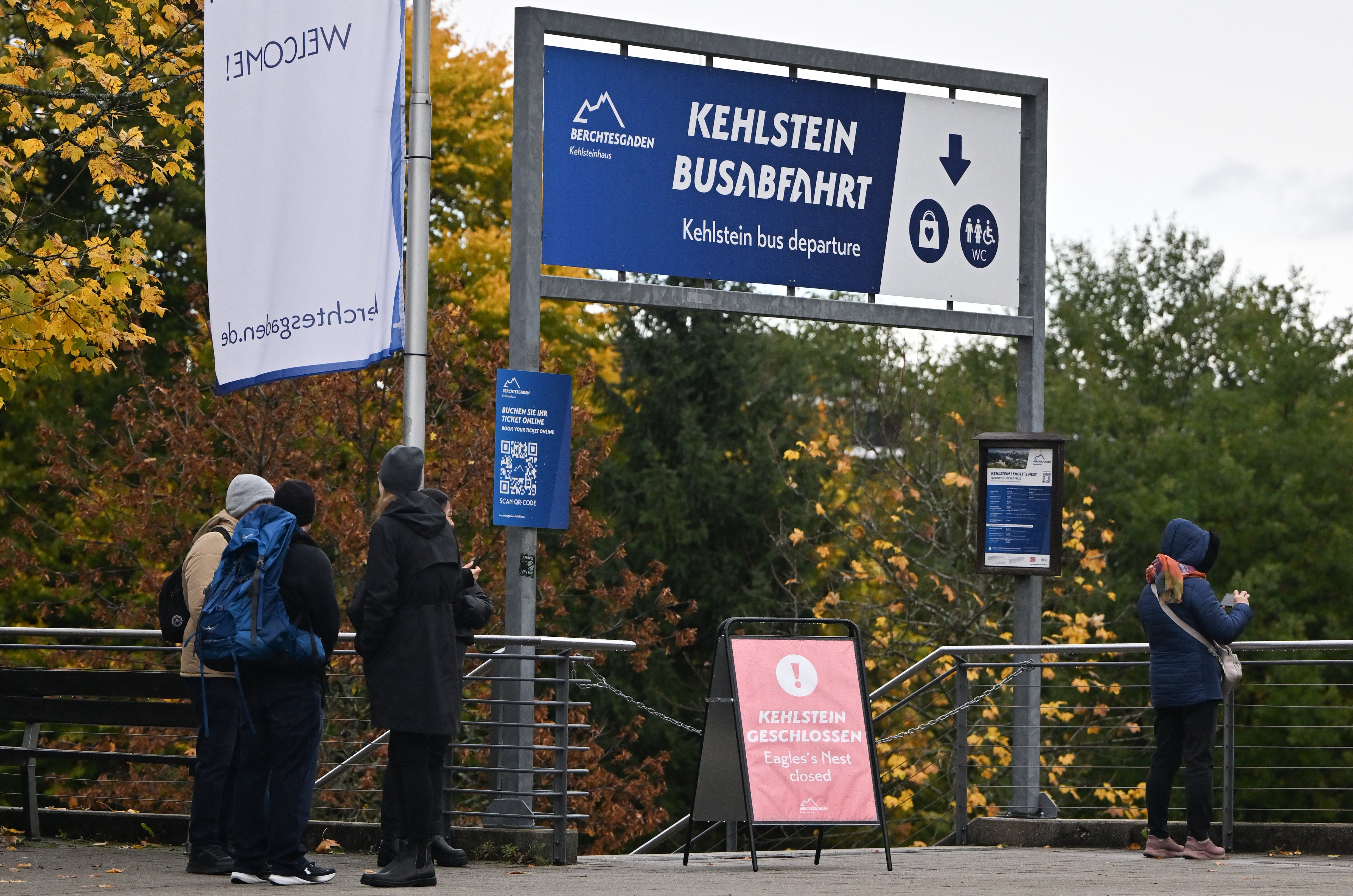 A sign at a bus stop advising visitors that the Eagle's Nest is closed