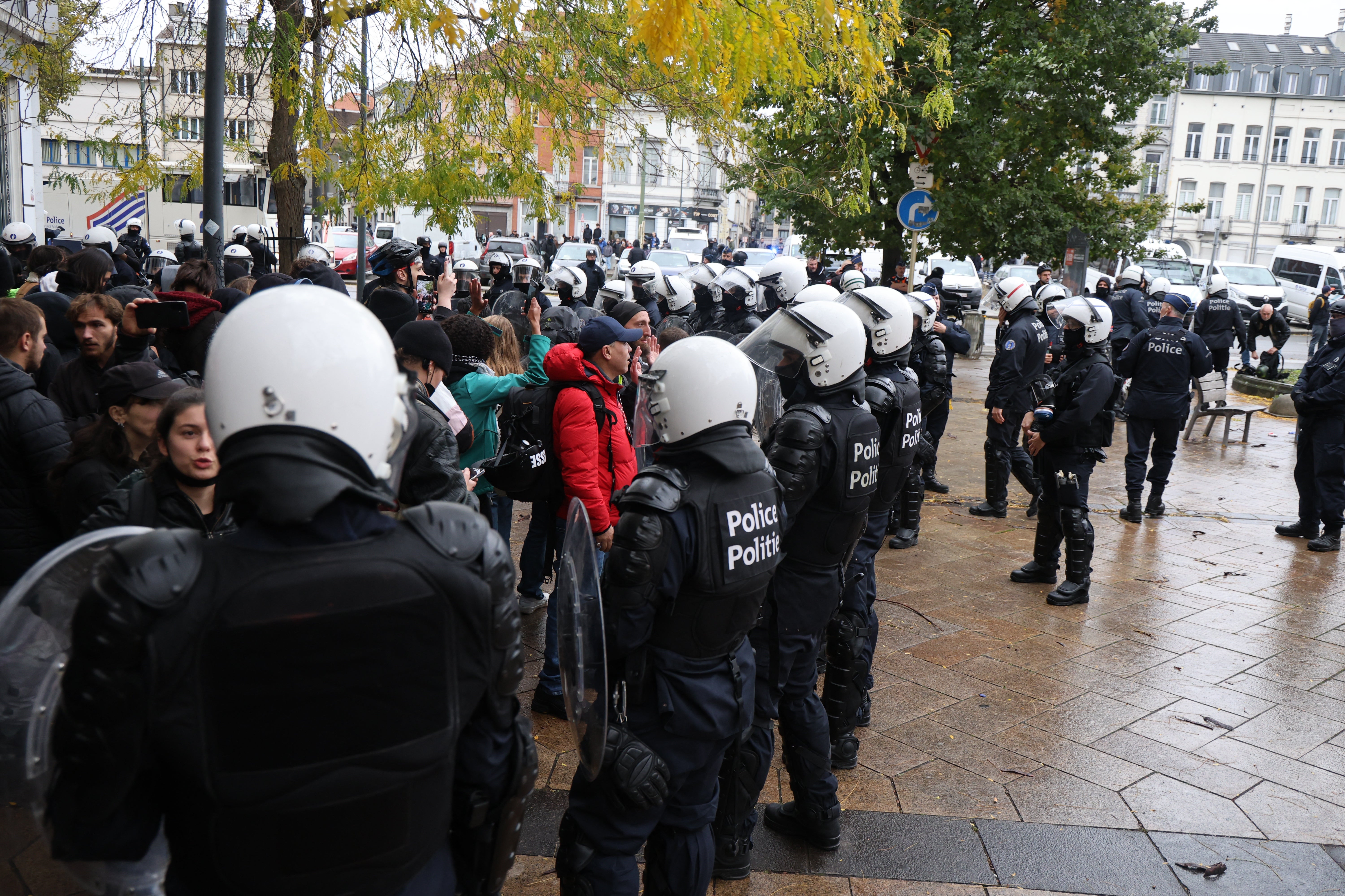 Belgian police used pepper spray and tear gas during confrontations in Brussels with anti-government protesters on Saturday