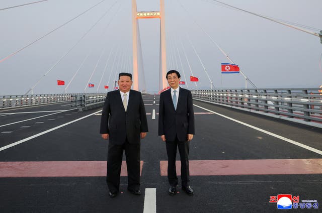 Kim Jong Un crosses New Yalu Bridge into China