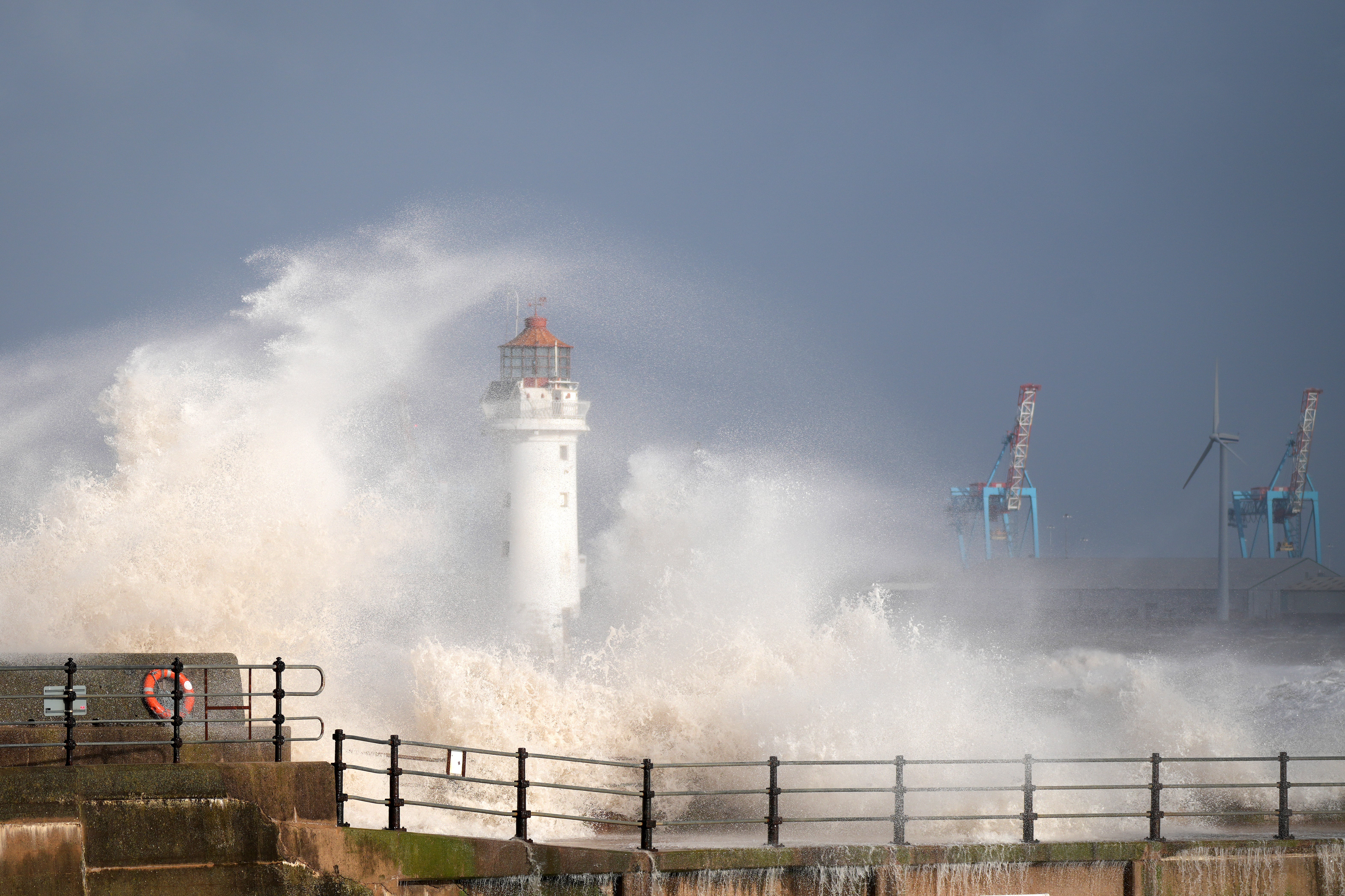 Waves created by the high winds of Storm Boelo hit the sea wall at New Brighton promenade