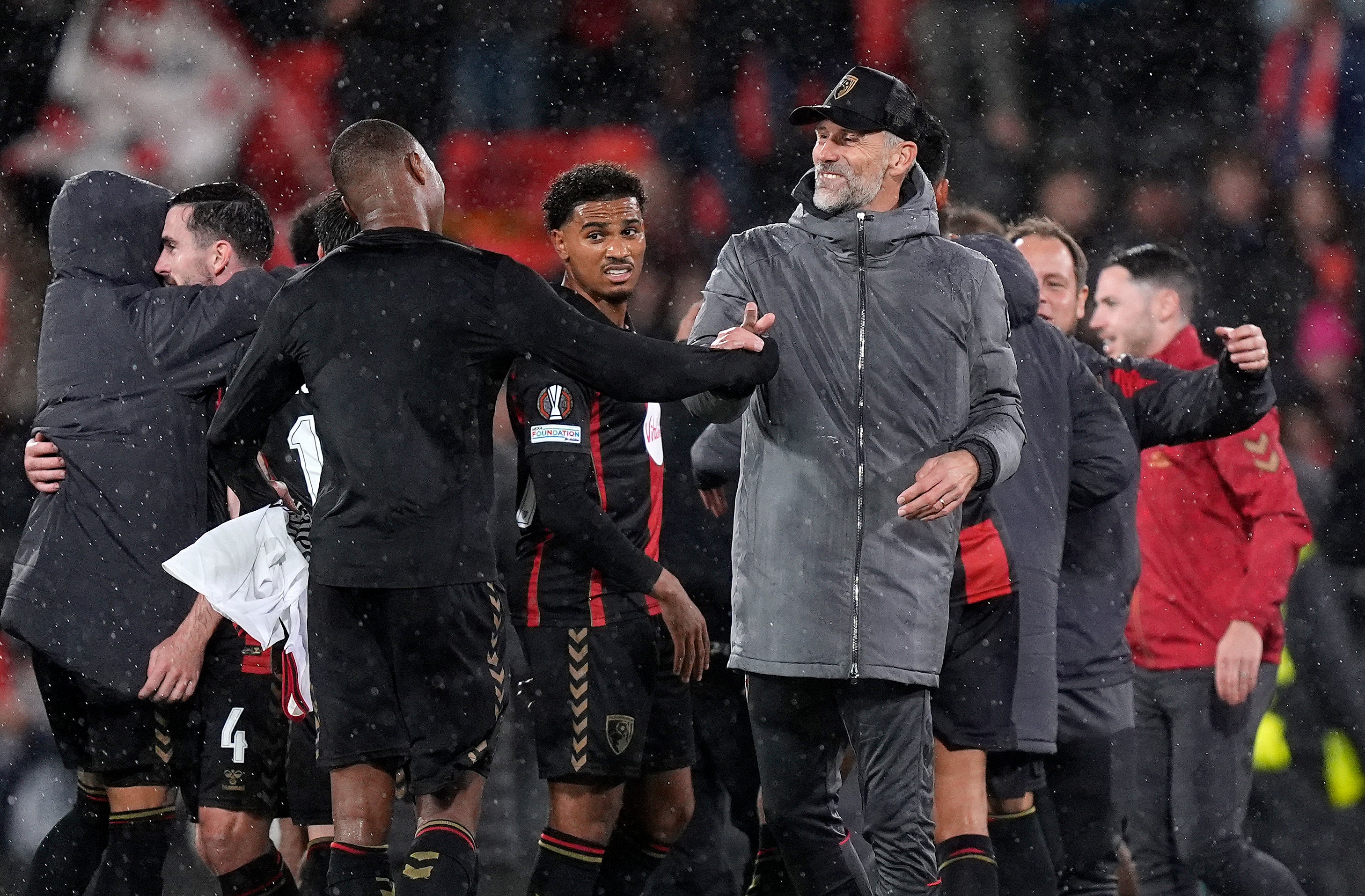 Marco Rose (centre right) and Bournemouth celebrated an iconic win over AC Milan