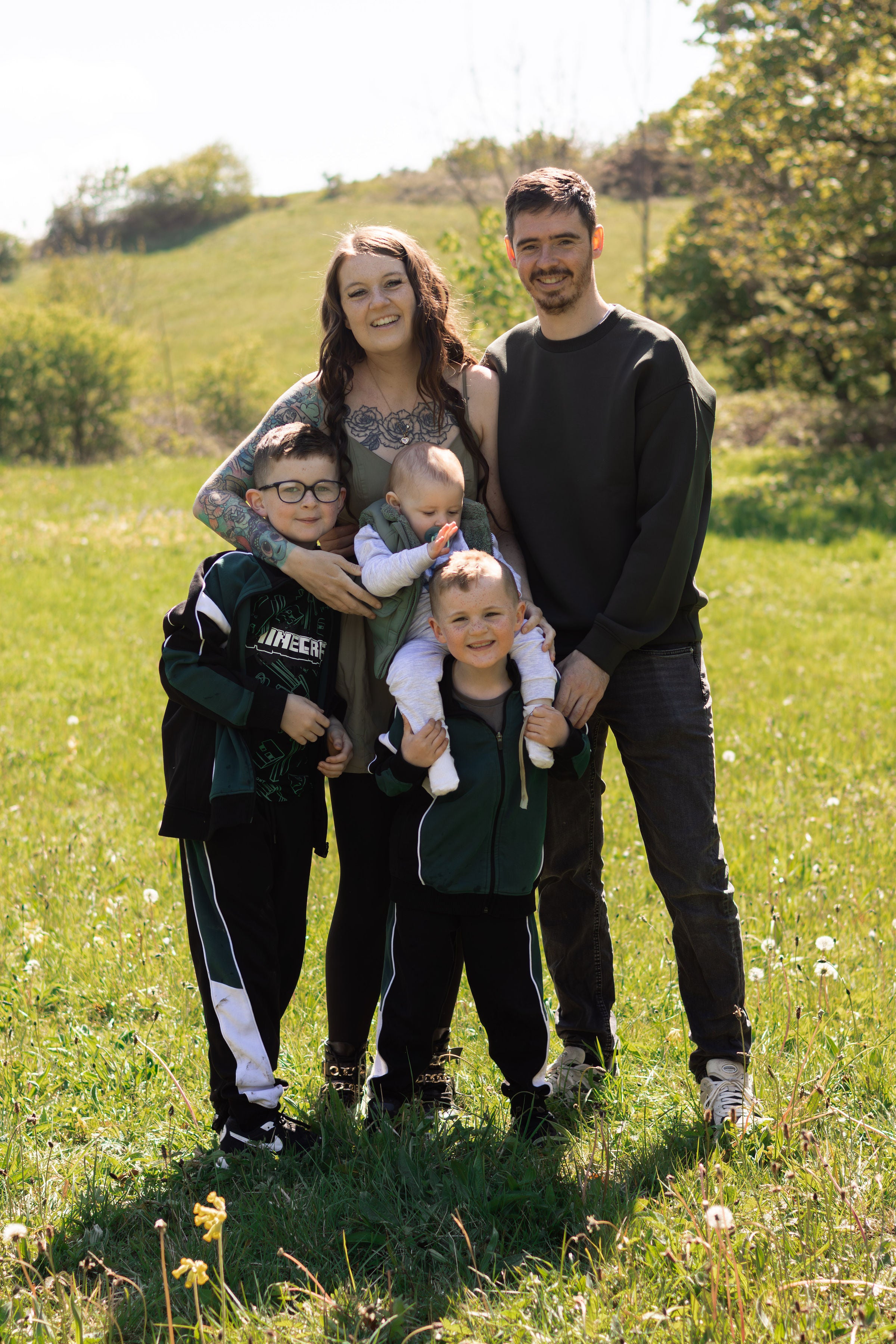 Cancer patient Holly Stubbs with her partner Lee and her three children Lewis, Tommy and Harry