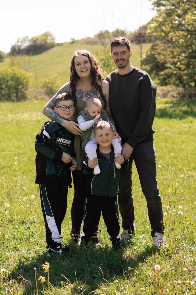 Cancer patient Holly Stubbs with her partner Lee and her three children Lewis, Tommy and Harry