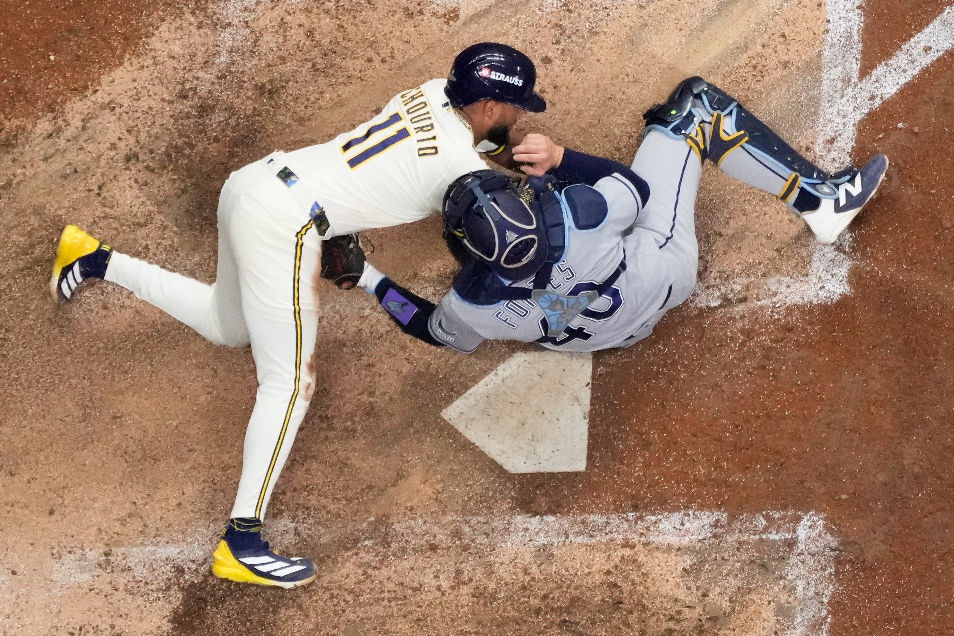 Photos of the Brewers and Rays battling for their first World Series ...