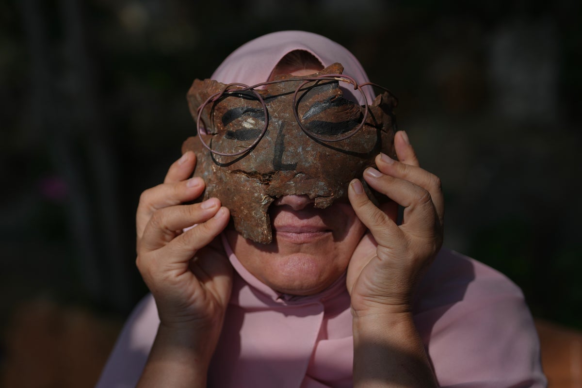 Lebanese artist turns shrapnel from Israeli munitions into art, in photos