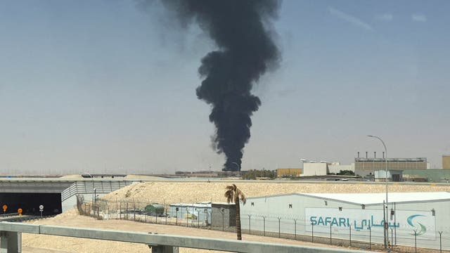Large plume of black smoke rises from the fuel storage area at King Khalid International Airport