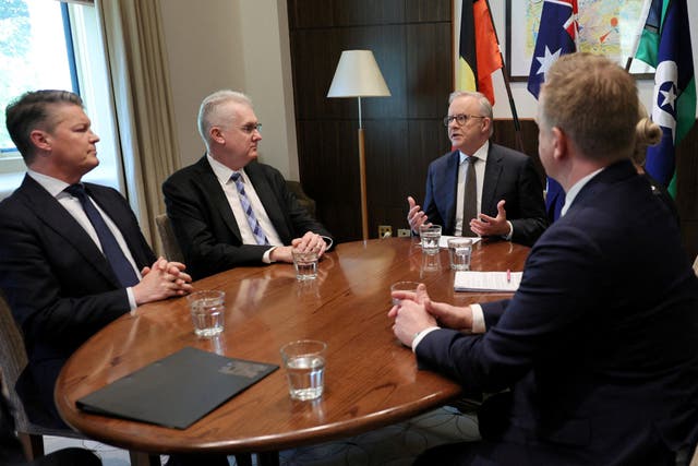 Australia’s Prime Minister Anthony Albanese speaks with Victorian Premier Ben Carroll, Australia’s Home Affairs Minister Tony Burke, Australian Federal Police Commissioner Krissy Barrett and Victorian Police Minister Paul Edbrooke following the attack on Asutralian lawmaker Helen Haines in Wangaratta, at the Commonwealth Offices in Melbourne, Australia
