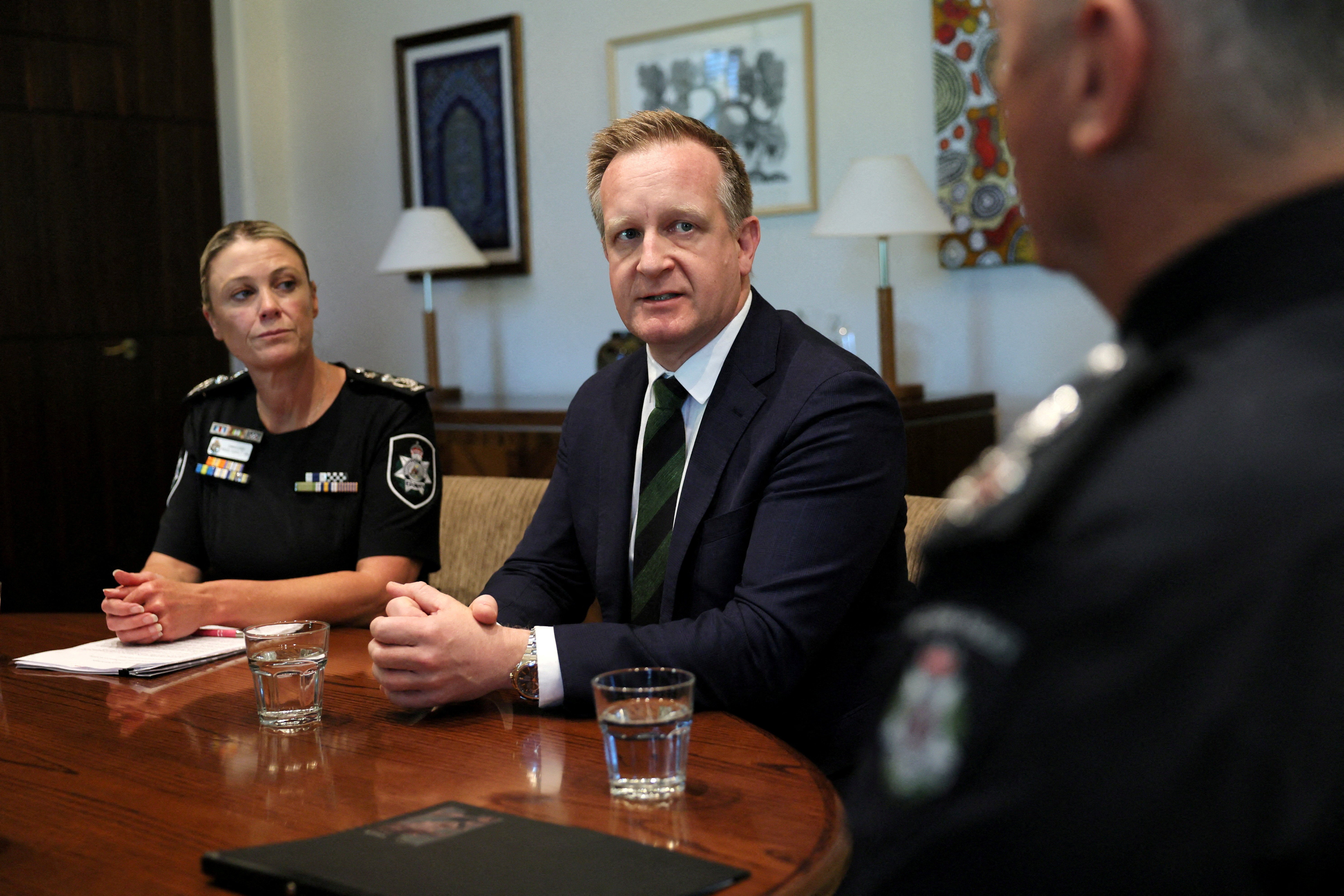 Australian minister says he is being followed after bullet etched with ‘RAT’ left on car