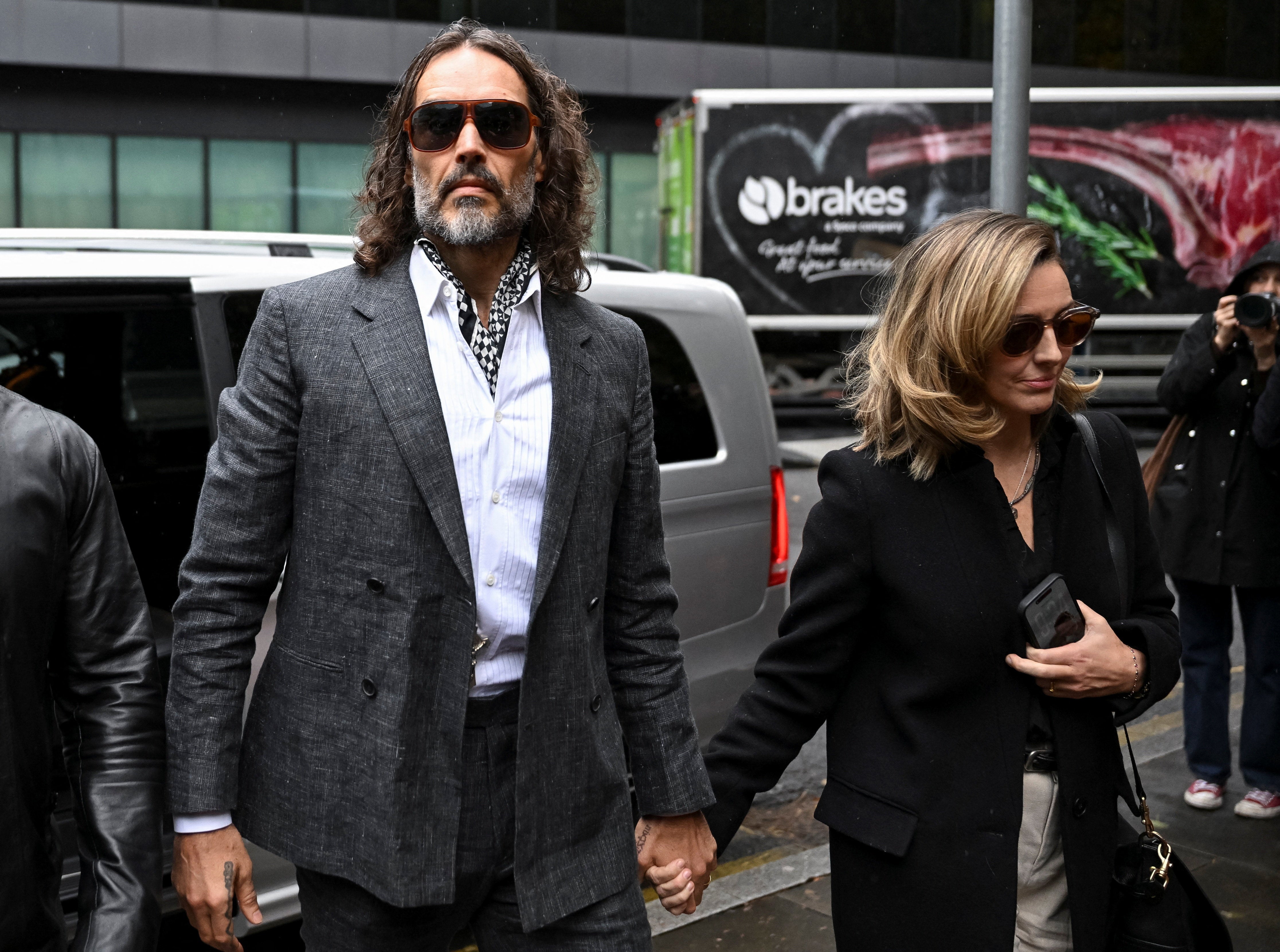 Russell Brand’s behaviour was ‘on another level’ and he was sleeping with people ‘day and night’, assistant claims