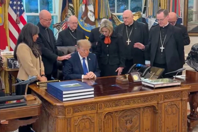 Catholic bishops apologize over photo of them praying with Trump