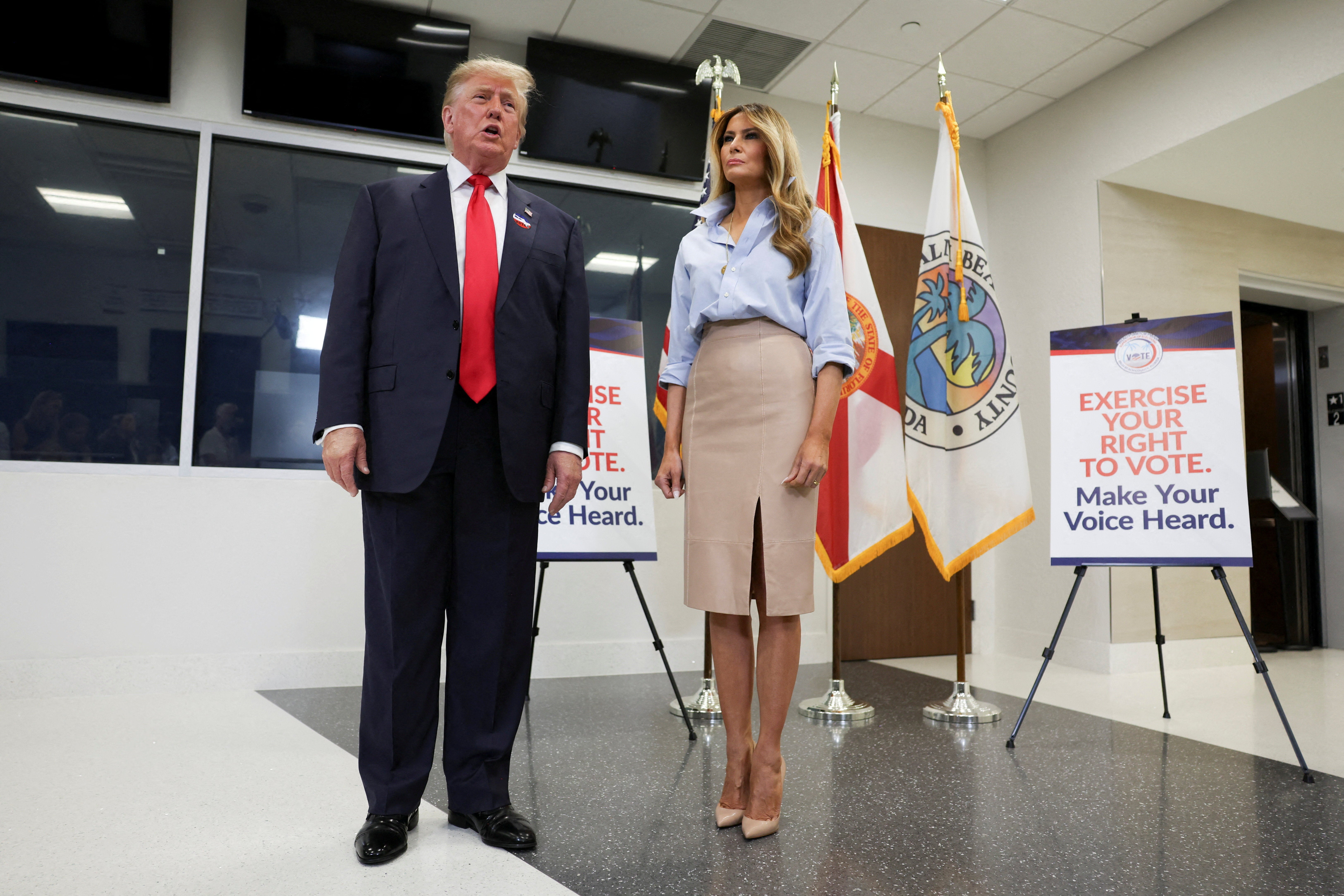 President Donald Trump speaks next to first lady Melania Trump after casting his ballot at the Palm Beach County Supervisor of Elections office, in the 2026 midterm elections in West Palm Beach, Florida, US, October 24, 2026