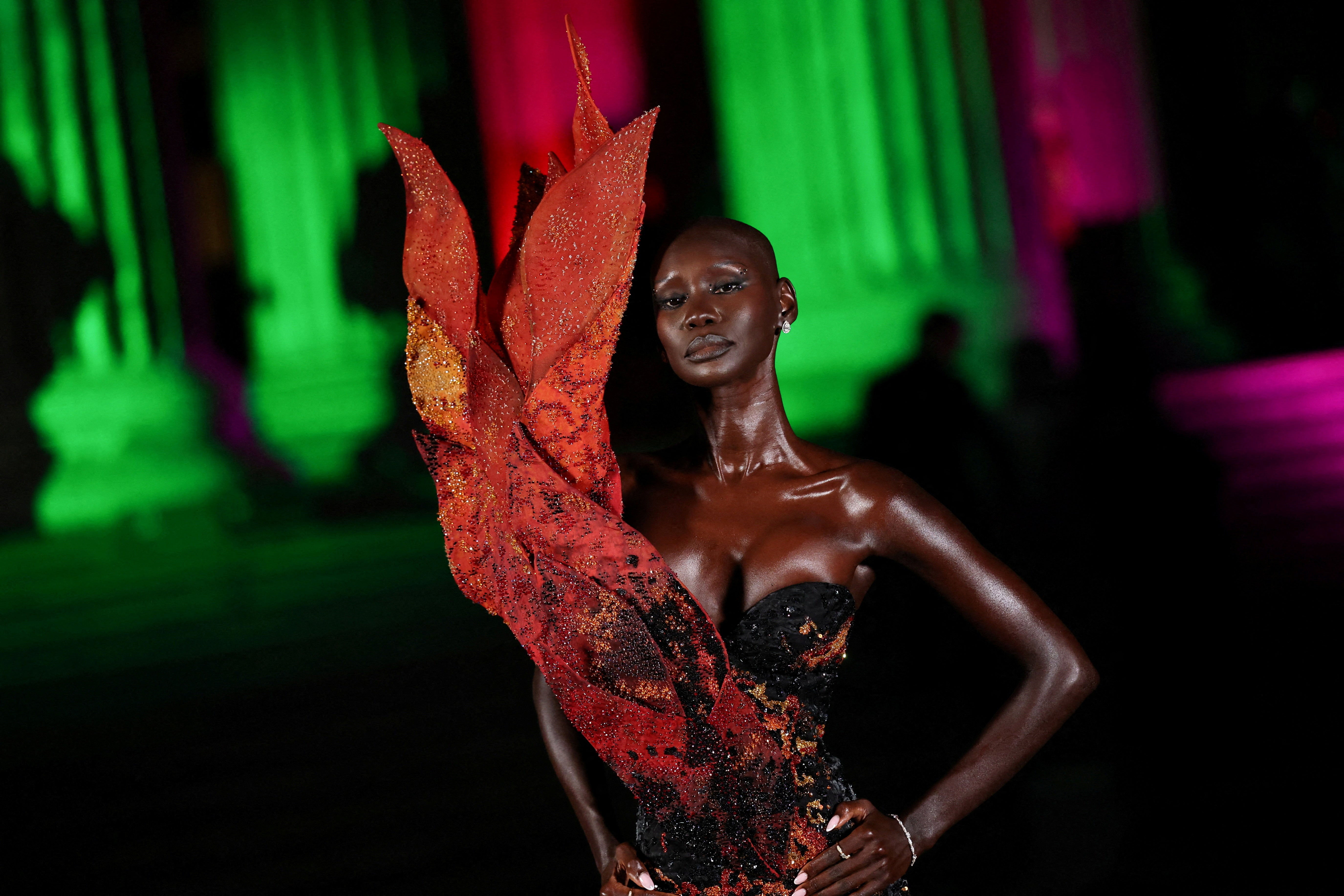 Fashion model Adot Gak poses as she arrives at the British Museum Ball