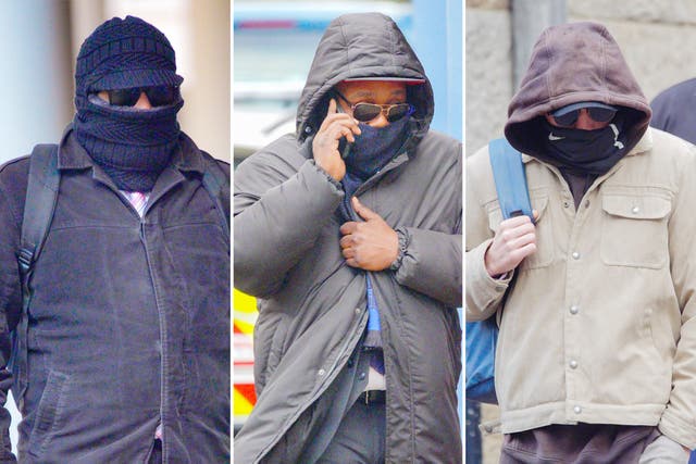 Mohammed Hassan, Norman Macksoni and Connor Sanderson-Doyle arrive at Winchester Crown Court on Tuesday ( PA )