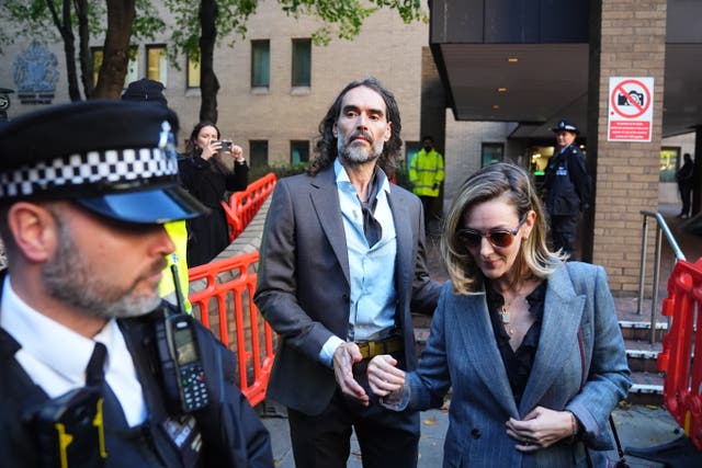 Russell Brand leaving Southwark Crown Court, London, where he faces three charges of rape, indecent assault, and three counts of sexual assault relating to six women. ( PA )