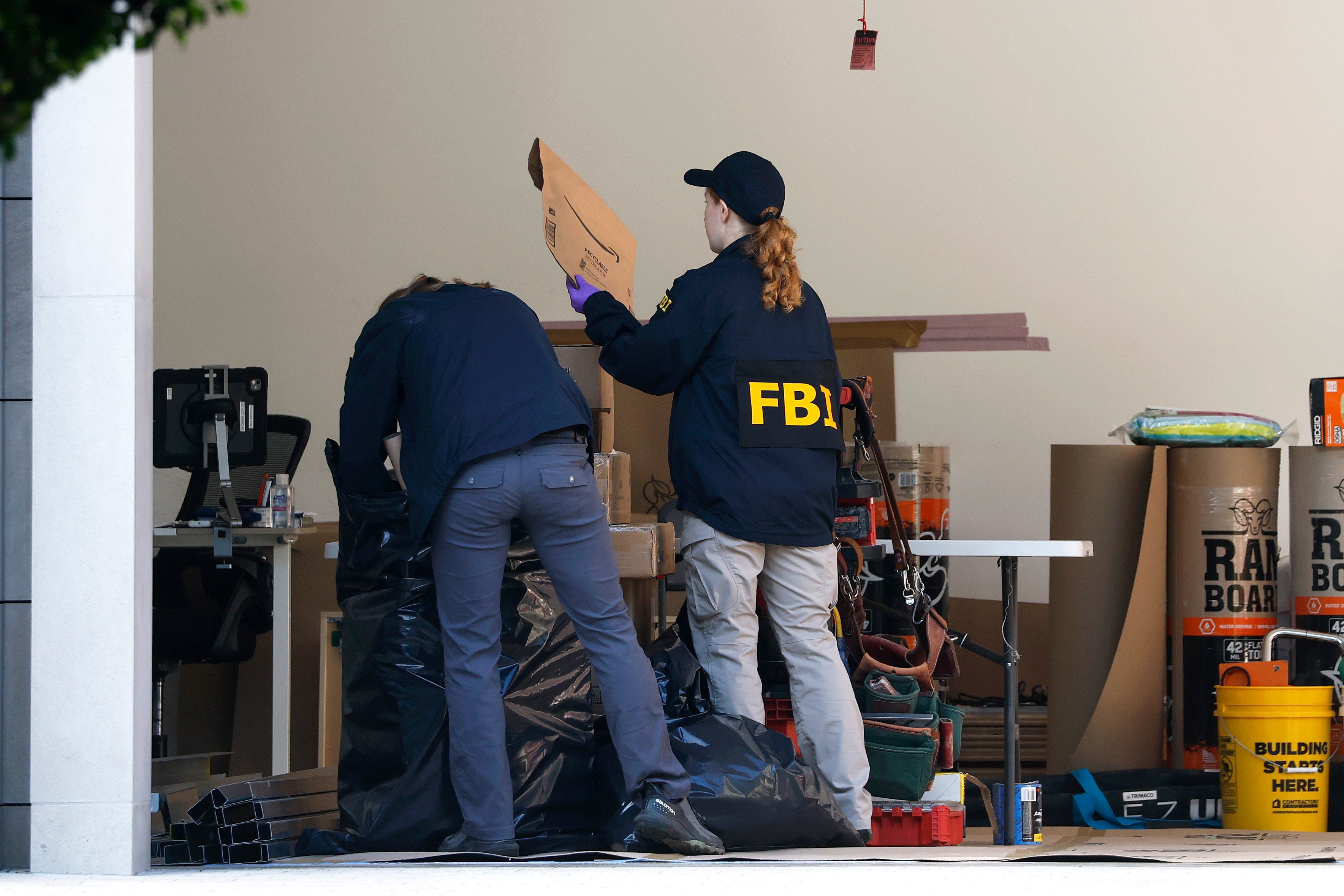Law enforcement search a home tied to an investigation into former U.S. Rep. Eric Swalwell (D-CA) on October 27, 2026 in Beverly Hills, California