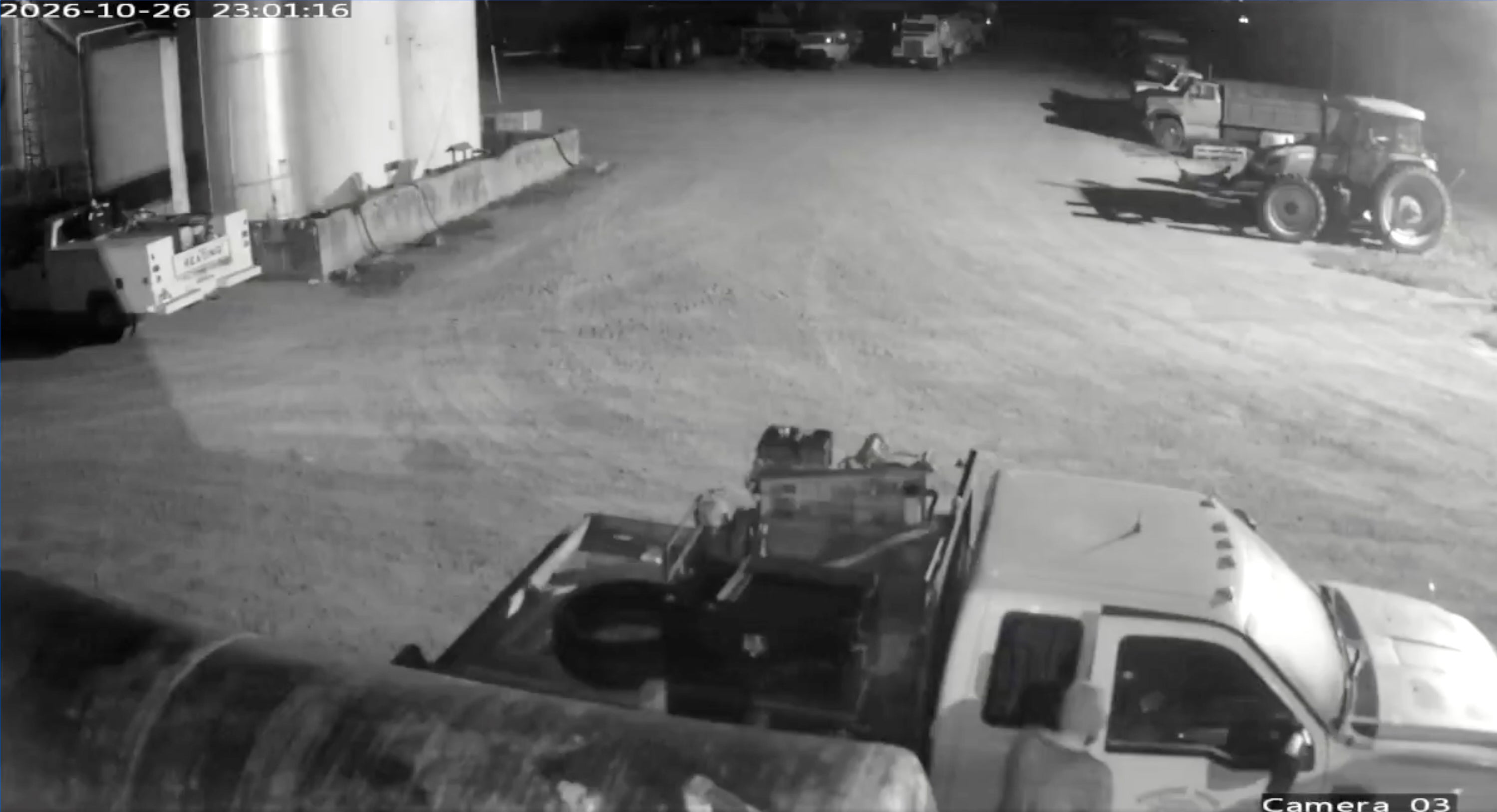 This image from security video provided by John Lindamood shows escaped inmate Jacob Allen Morley, bottom right, stealing a white Ford F-350 from the Lindamood Planting Company early Monday, Oct. 26, 2026, in Lake County, Tenn. (John Lindamood