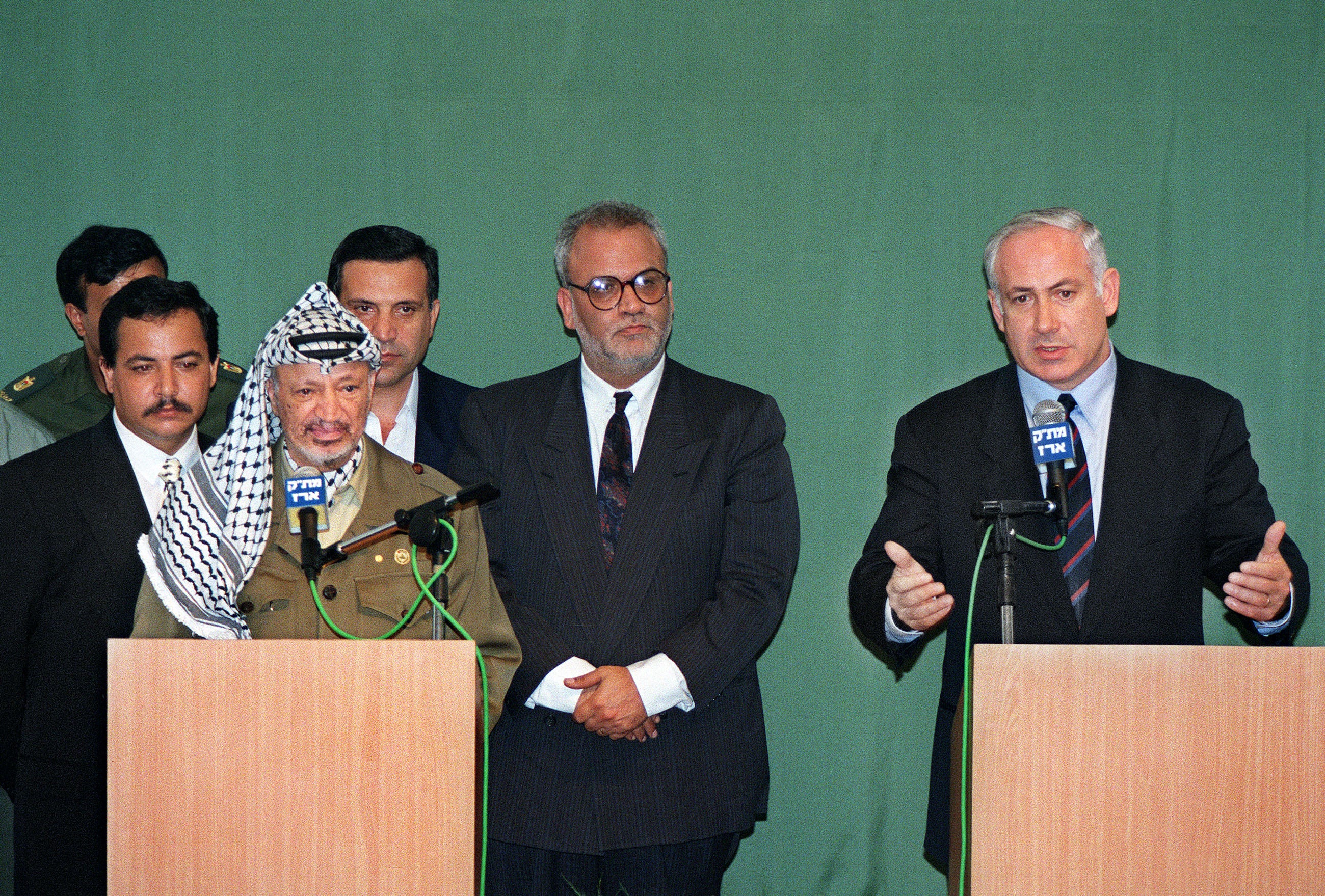 The Israeli prime minister with the late Palestinian President Yasser Arafat (L) in September 1996