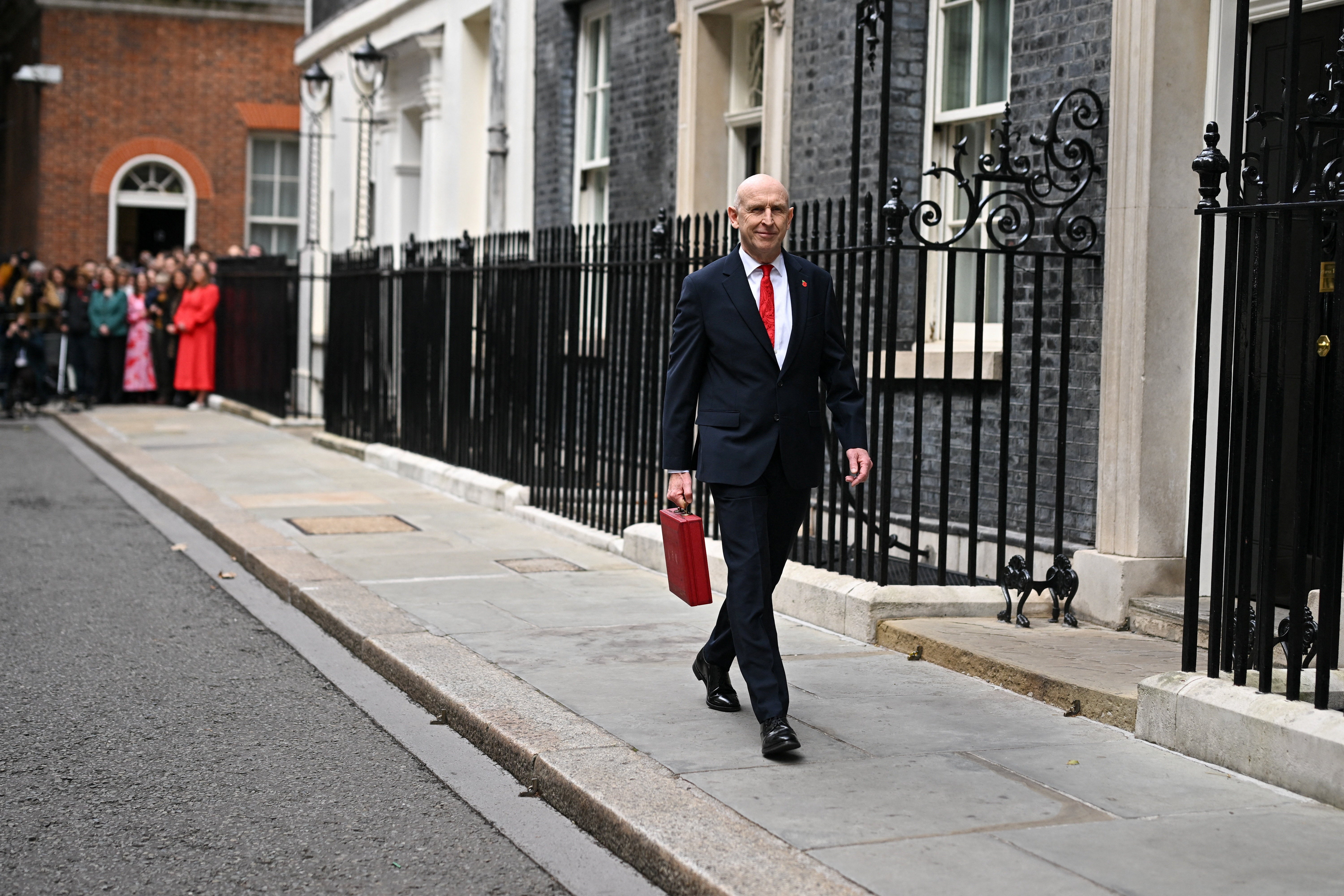 Chancellor John Healey leaves 11 Downing Street, London, with his ministerial red box, before delivering his first Budget to the Houses of Parliament (Dylan Martinez/PA)