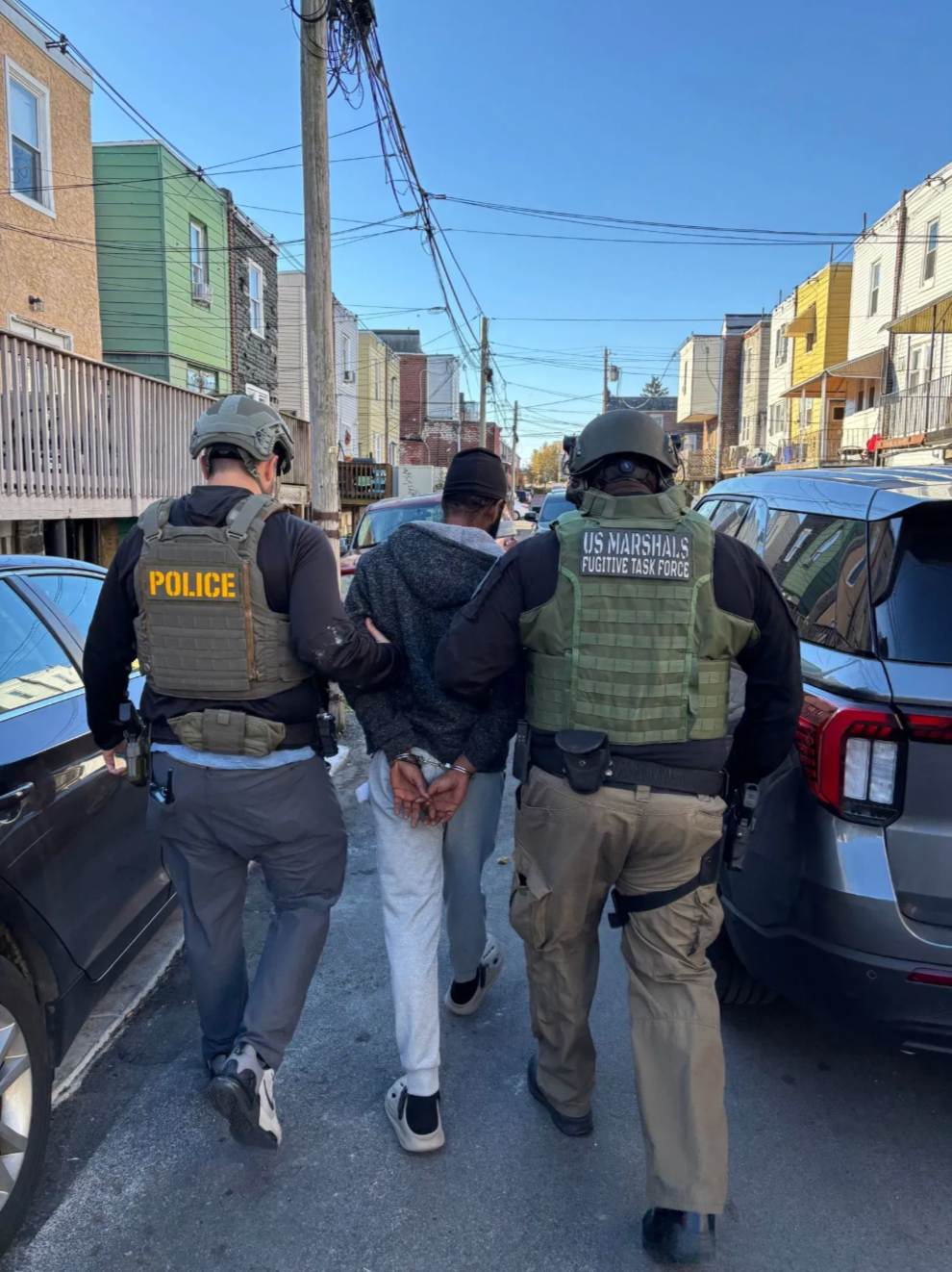 Federal marshals initially took Jean-Louis into custody on immigration violations outside a Philadelphia home, allowing authorities to detain him before murder charges were filed