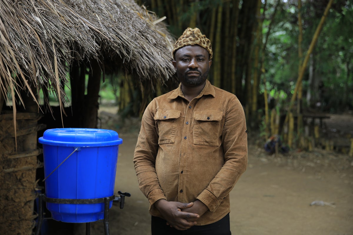 A village chief in Congo works to overcome Ebola prejudice even as the disease kills his relatives