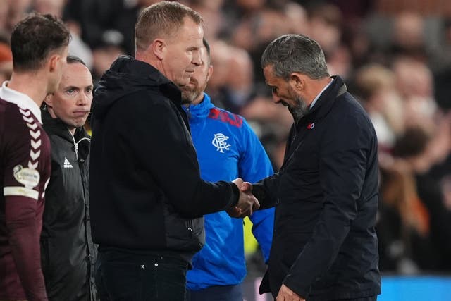 <p>Rangers manager Derek McInnes and Heart of Midlothian manager Wouter Vrancken clashed at the end of the 2-2 draw </p>