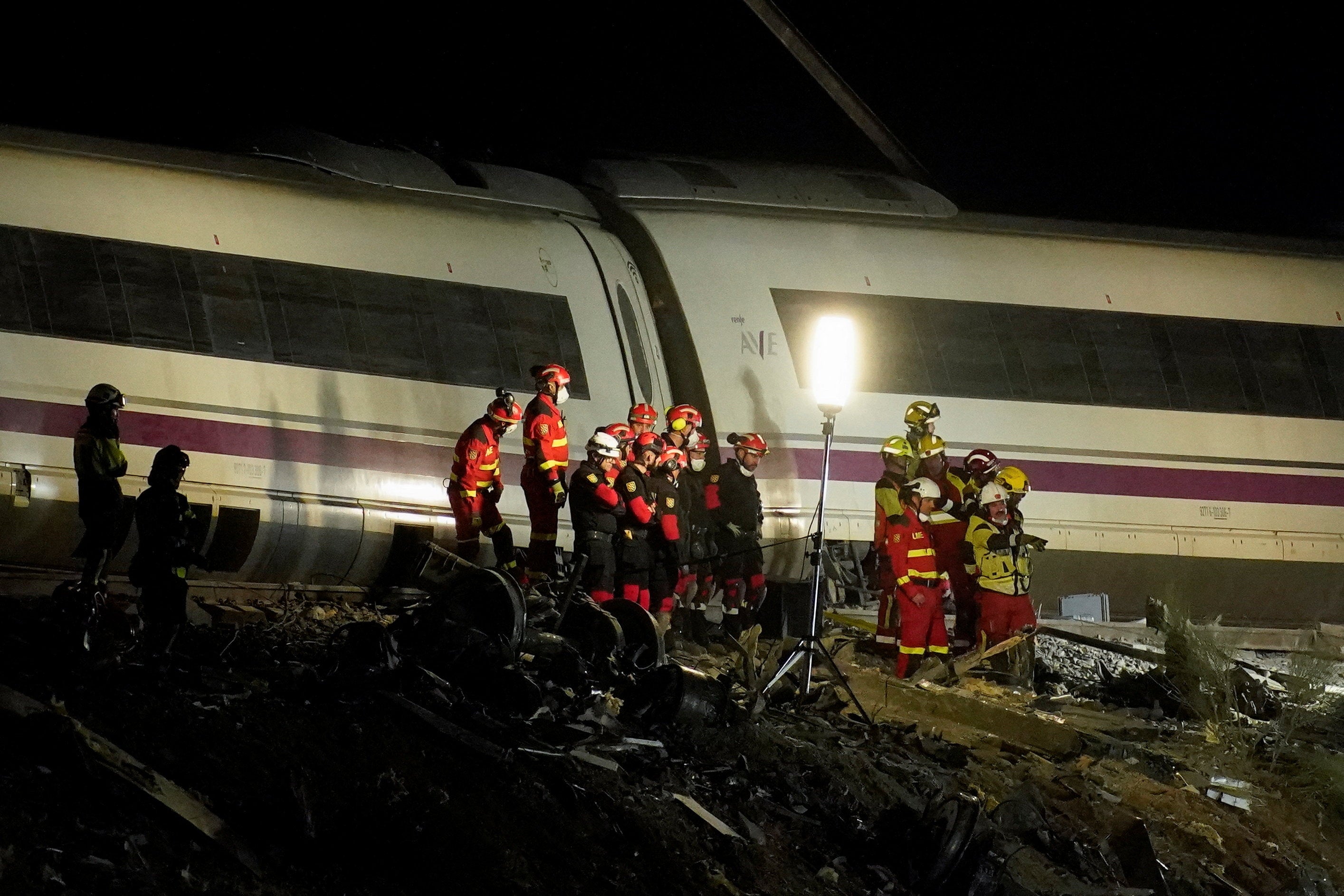 Rescue personnel work at the site of the collision of two high-speed trains between the towns of Mora and Orgaz, near Toledo, Spain, October 28, 2026.