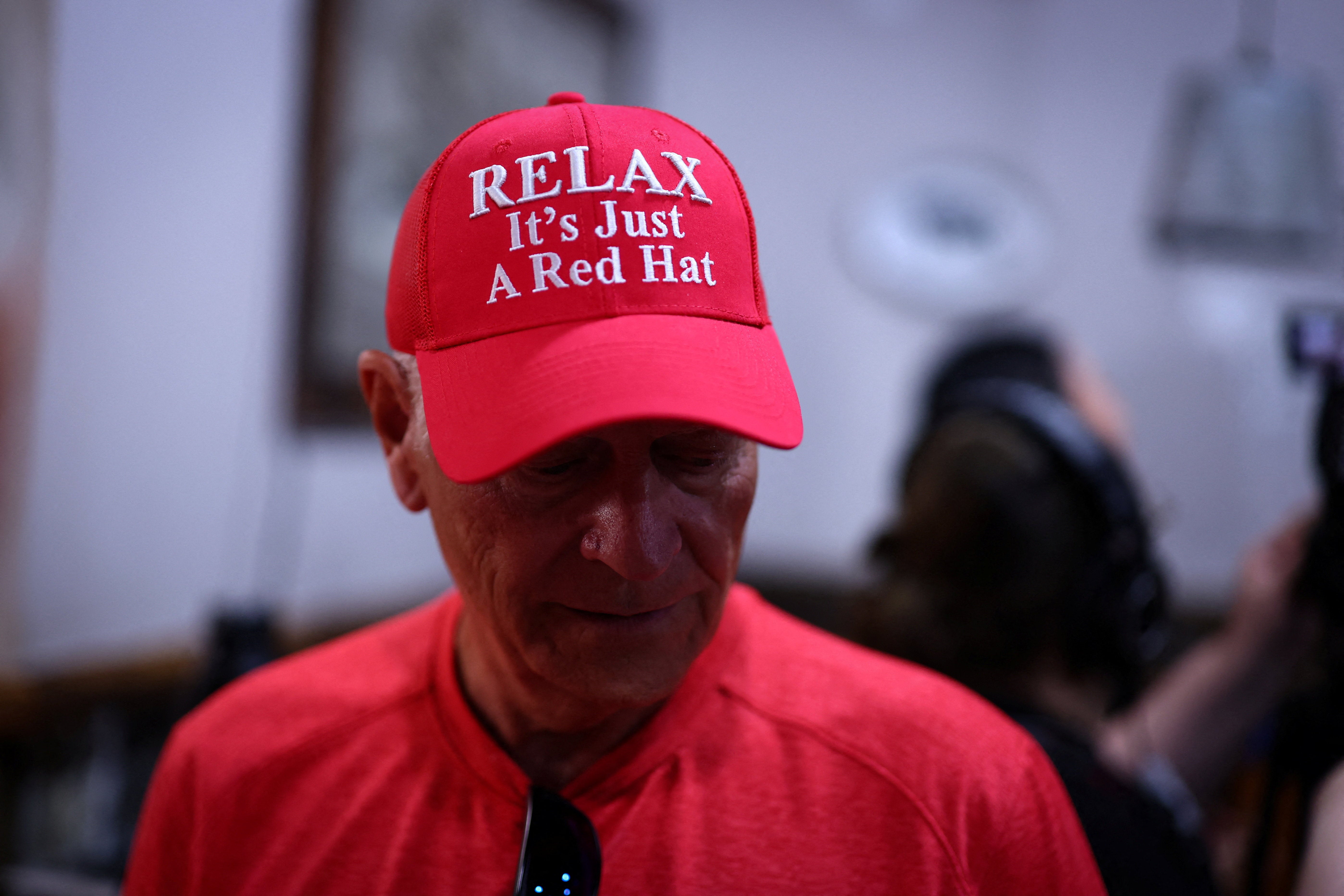 A supporter of the Republican candidate for US Senate from Texas, Ken Paxton, attends a campaign rally at Betty Rose's Little Brisket barbecue ahead of the November 3rd US midterm elections
