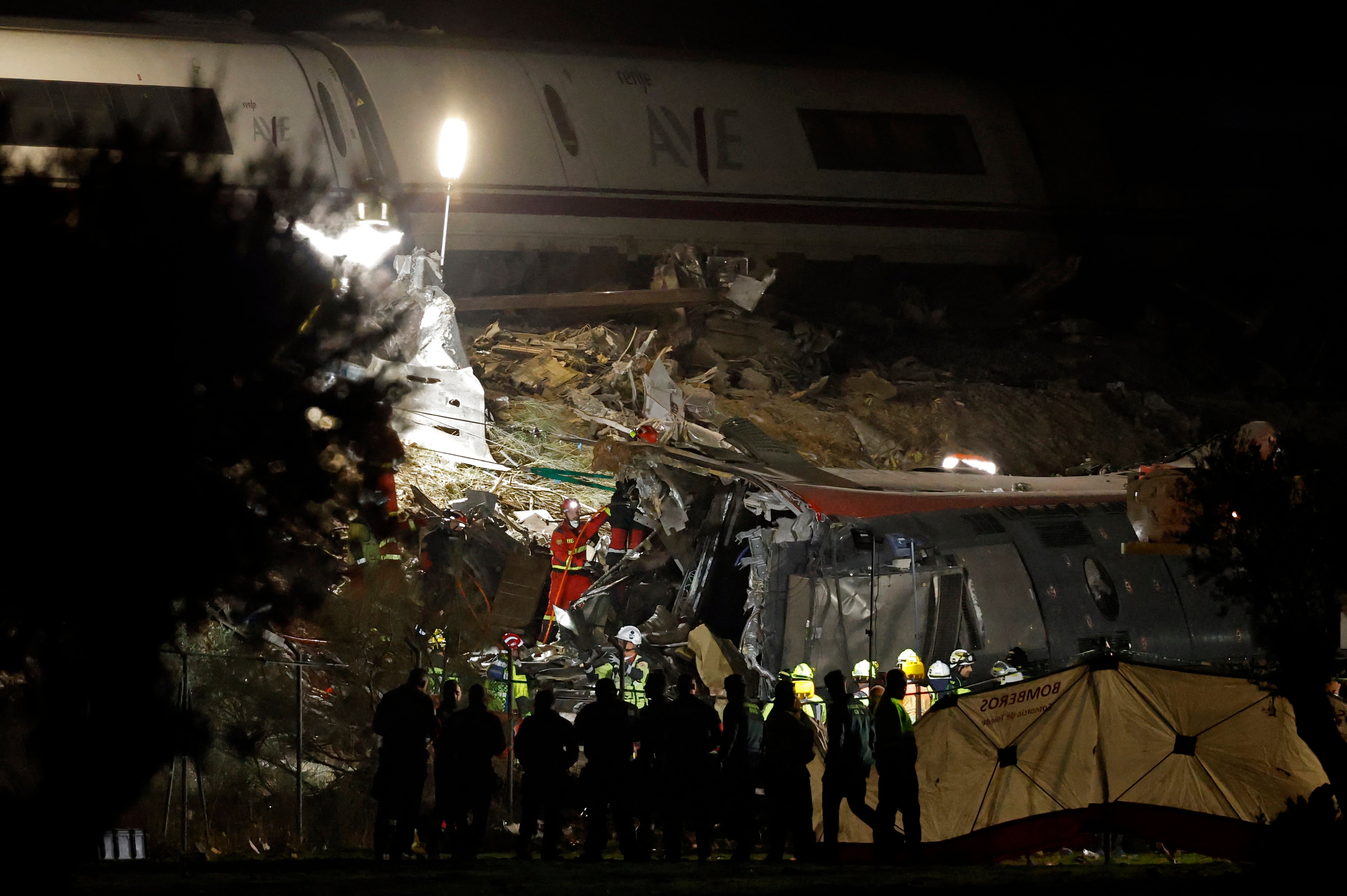 Emergency services work at the site of a train crash between two high-speed units, a Renfe AVE train and an Iryo train around 150 km south of Madrid between Urda and Los Yebenes in the province of Toledo