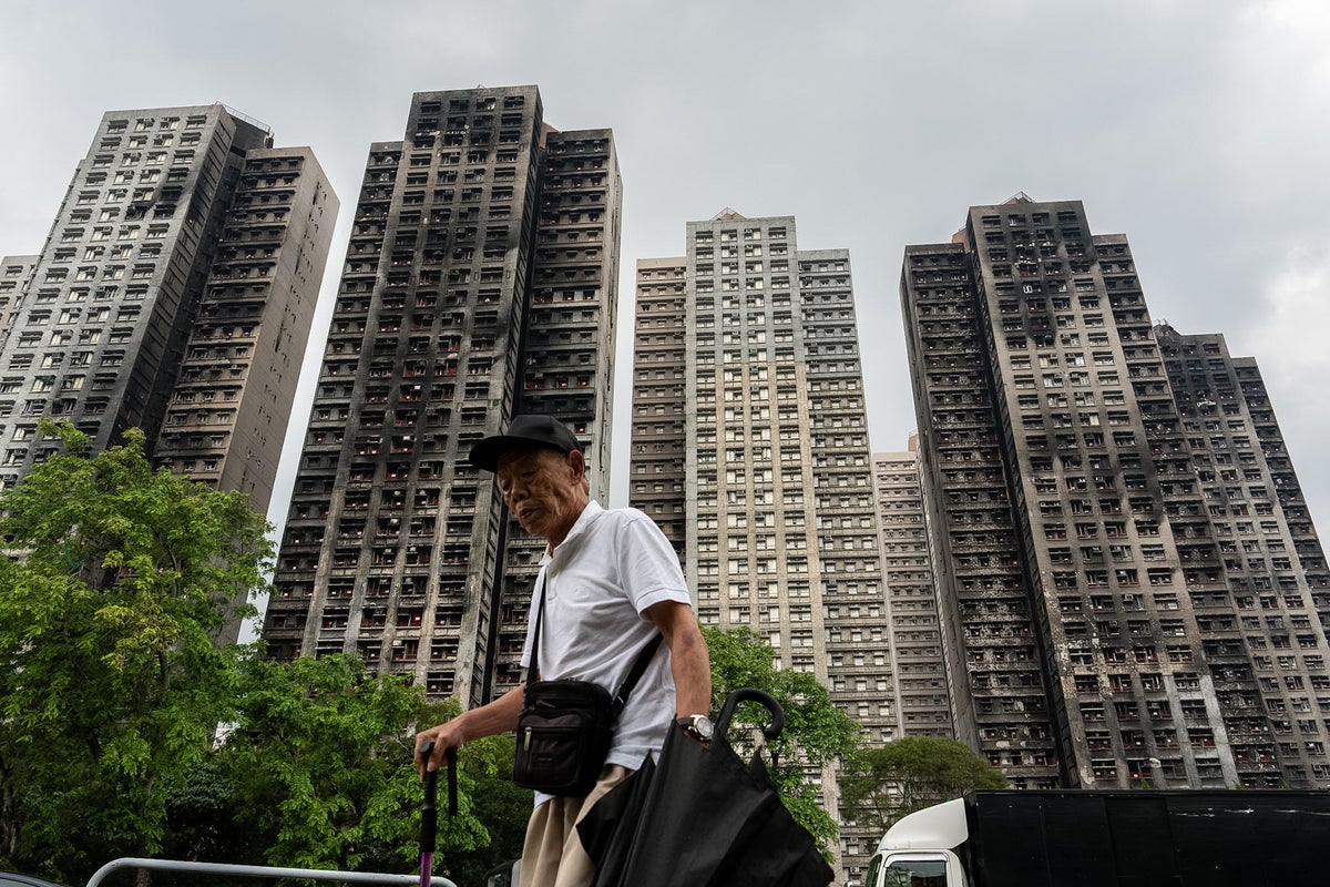 Hong Kong's housing minister resigns after fire investigation finds inadequate oversight