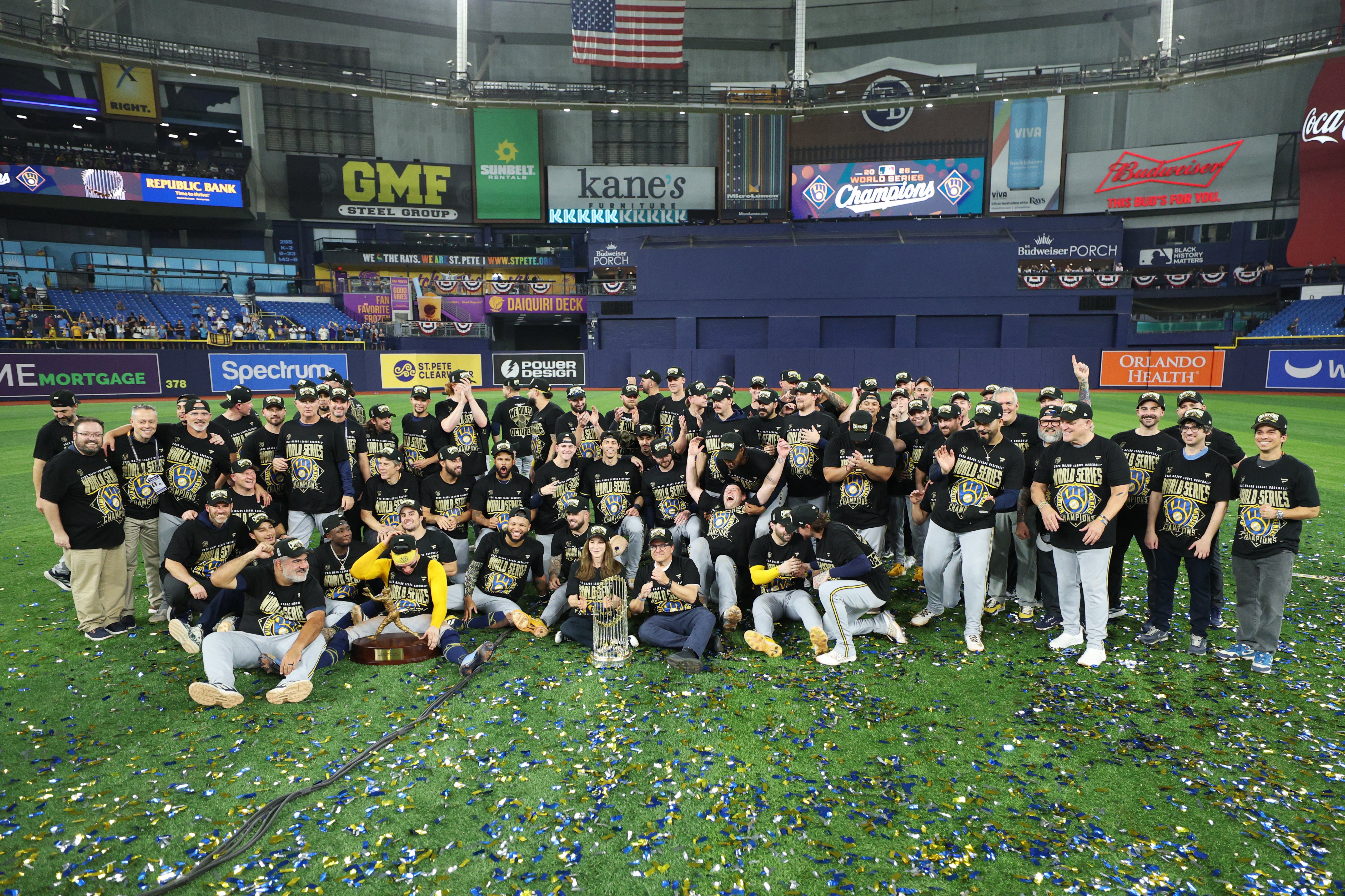 The Milwaukee Brewers celebrate on the field after defeating the Tampa Bay Rays