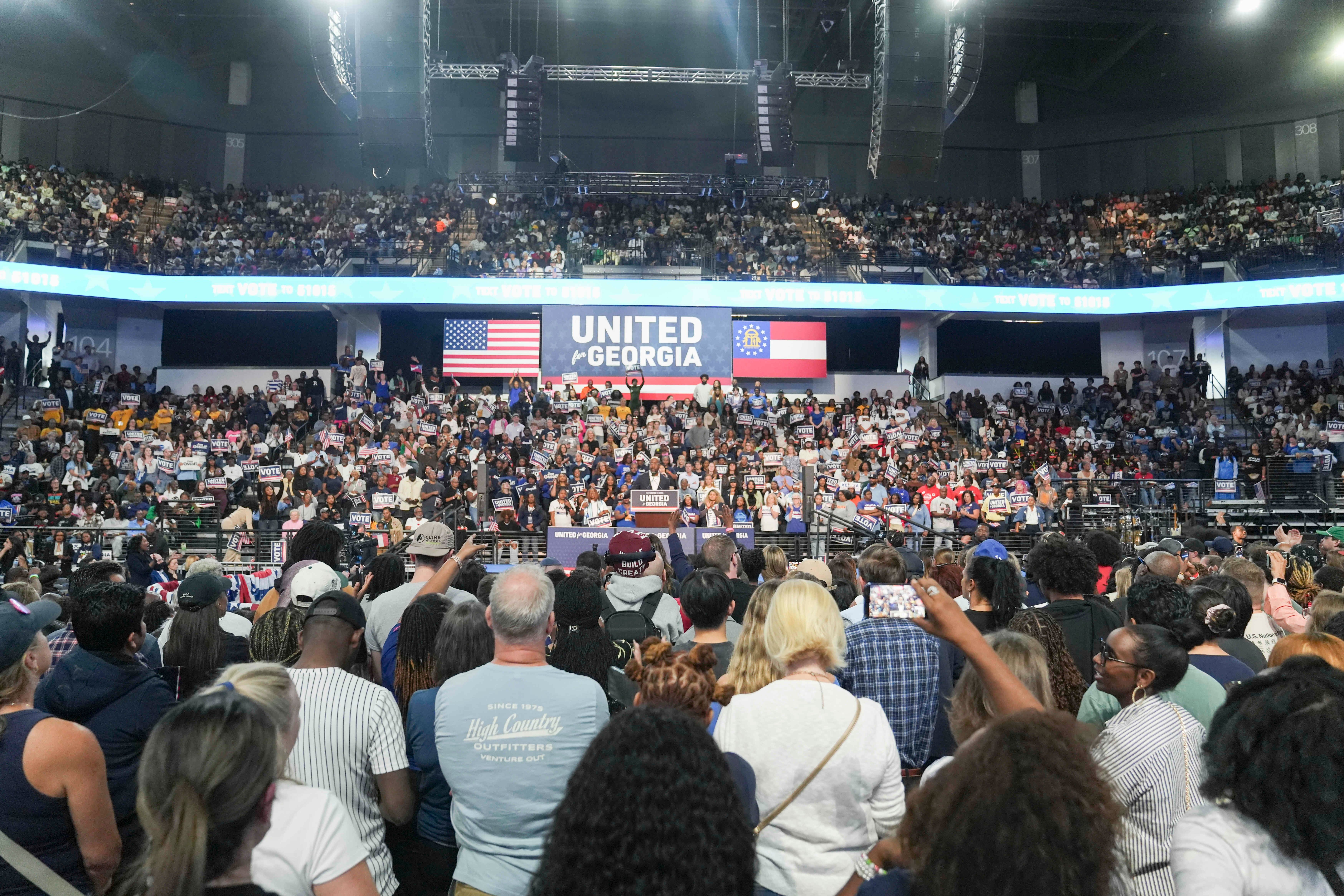Forty-seven percent of those who have already voted are Democrats, compared to 35 percent who are registered as Republicans. This image shows a Democratic rally in Georgia