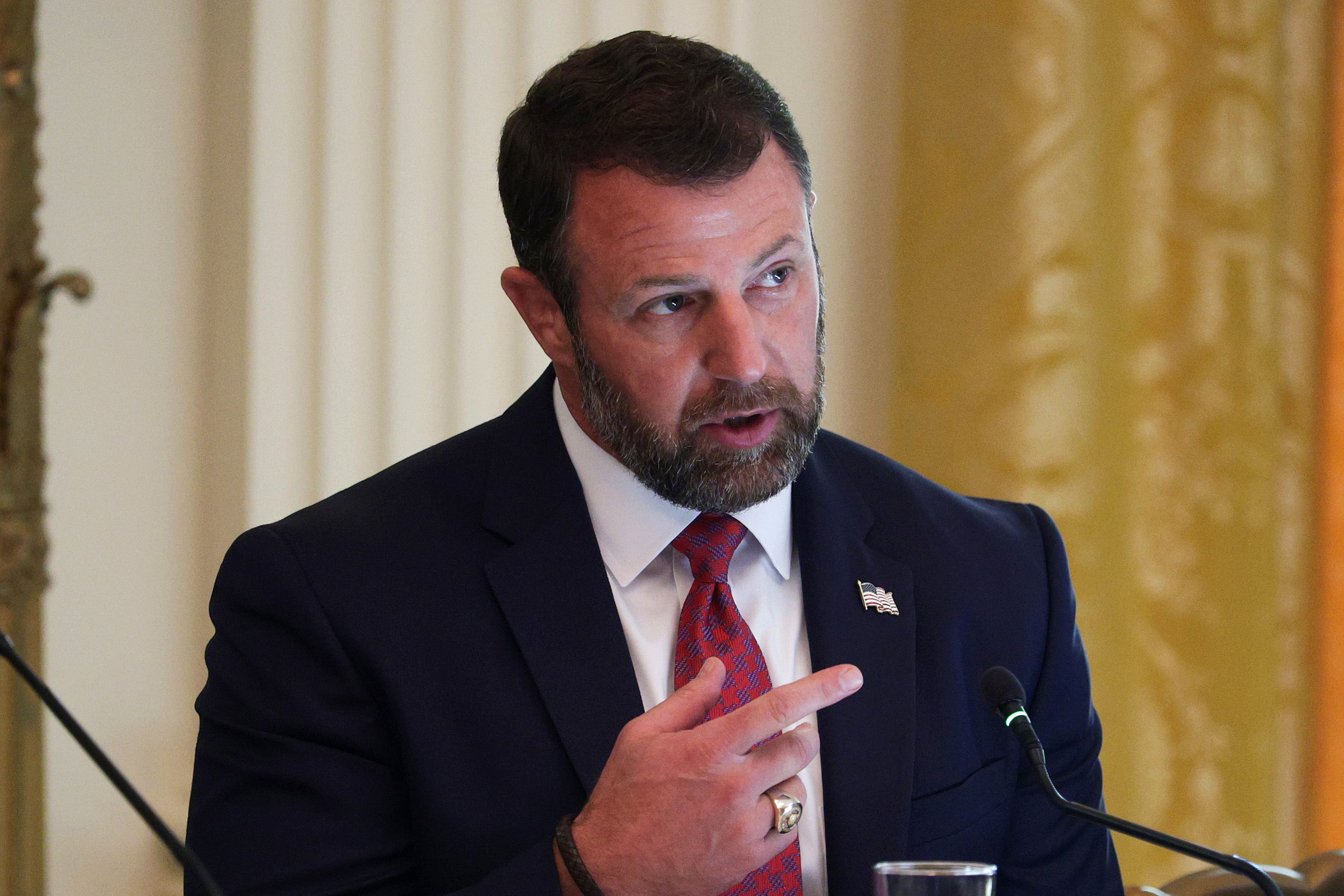 Secretary of Homeland Security Markwayne Mullin speaks during a roundtable discussion on cybercrime in the East Room of the White House on October 21