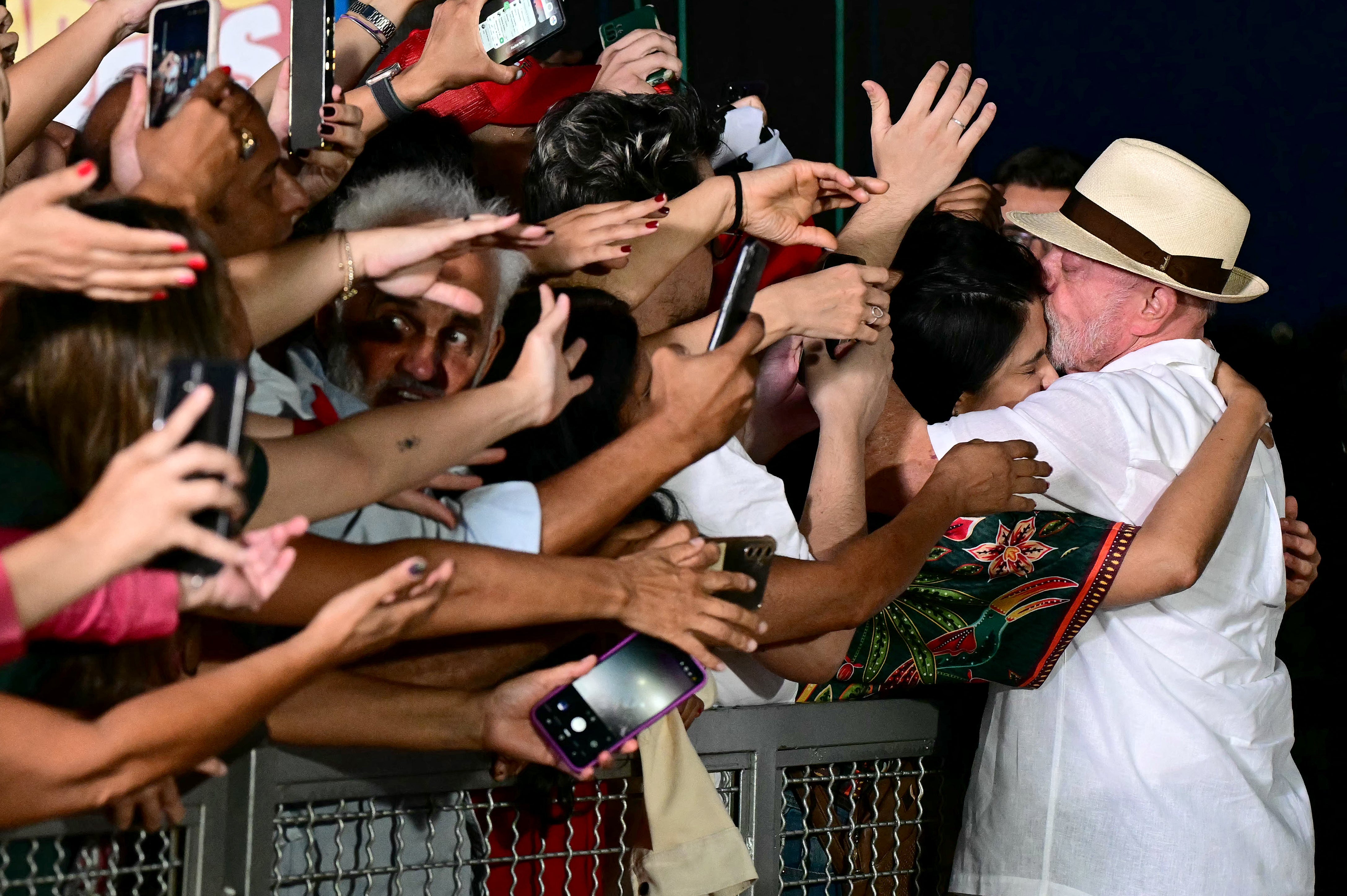 Brazil's President Luiz Inacio Lula da Silva greets supporters as part of his birthday celebrations at the Alvorada Palace